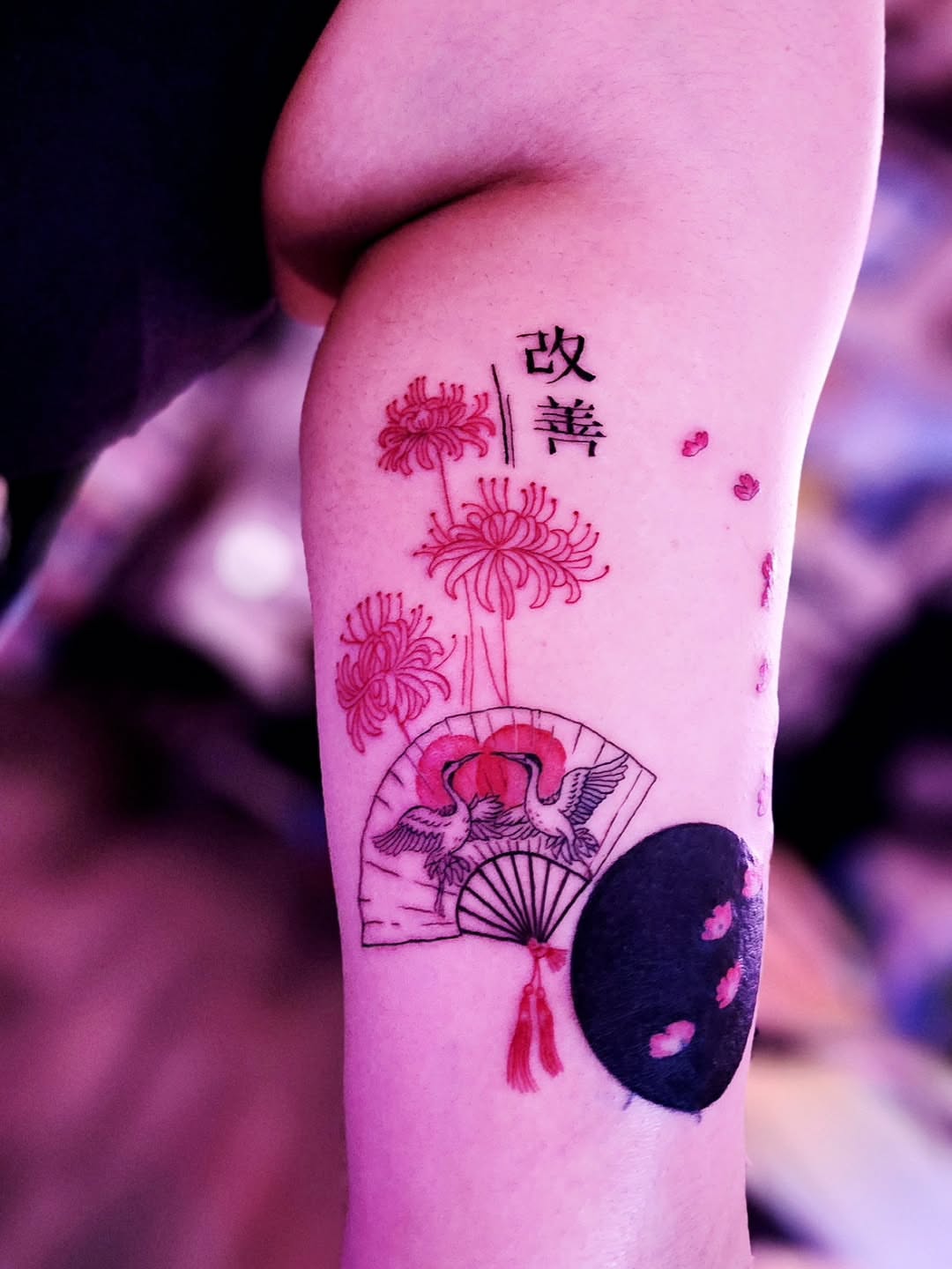 Chrysanthemums and fan dotwork tattoo on the forearm by Luke Jordan Ink, Louisville, Colorado