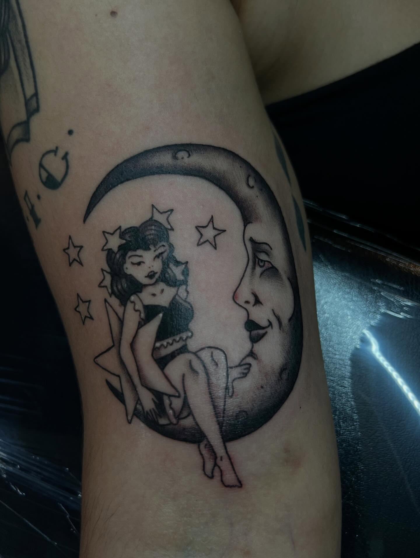 Moon and fairy illustrative tattoo on the forearm by Ady Paige