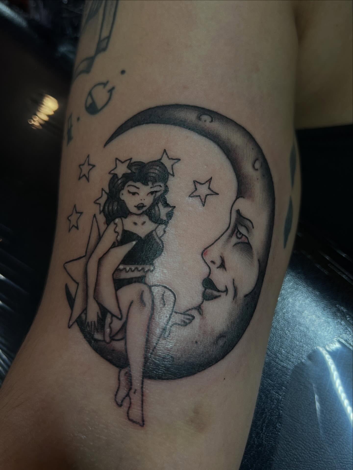 Woman on crescent moon realism tattoo on the forearm by Ady Paige