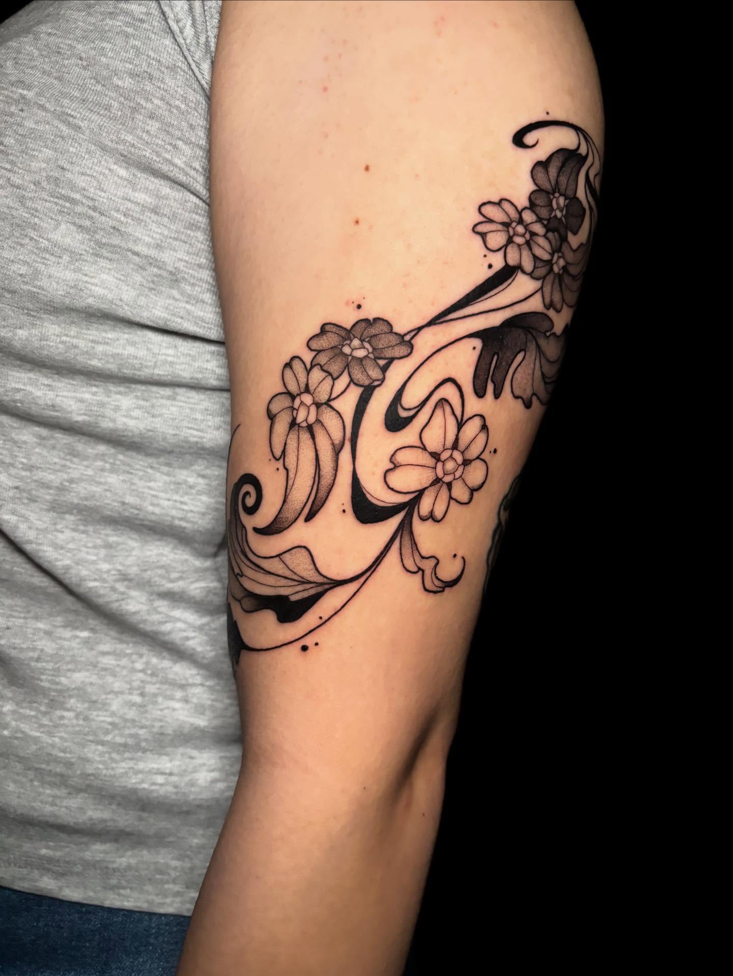 Floral vine black and grey tattoo on the forearm by Wren Hollow, Portland, Oregon