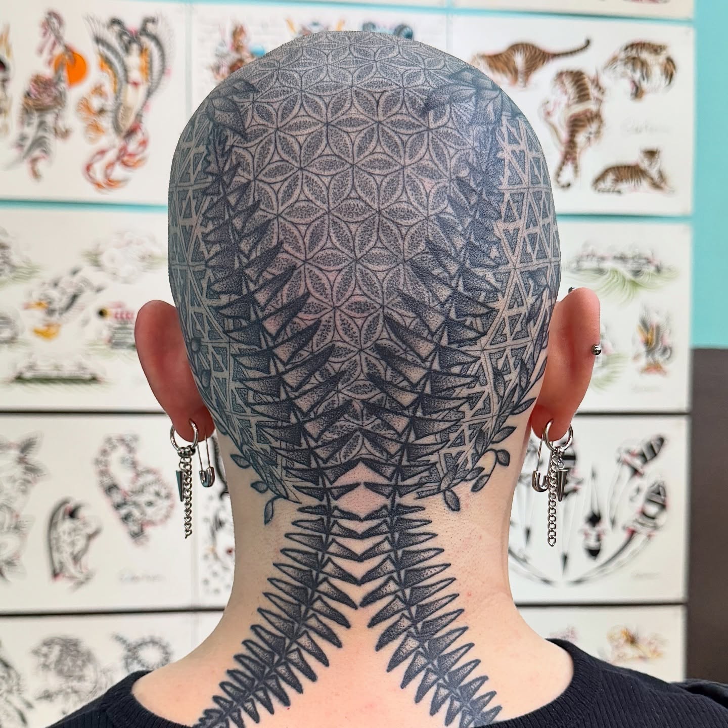 Geometric pattern geometric tattoo on the head by Sam