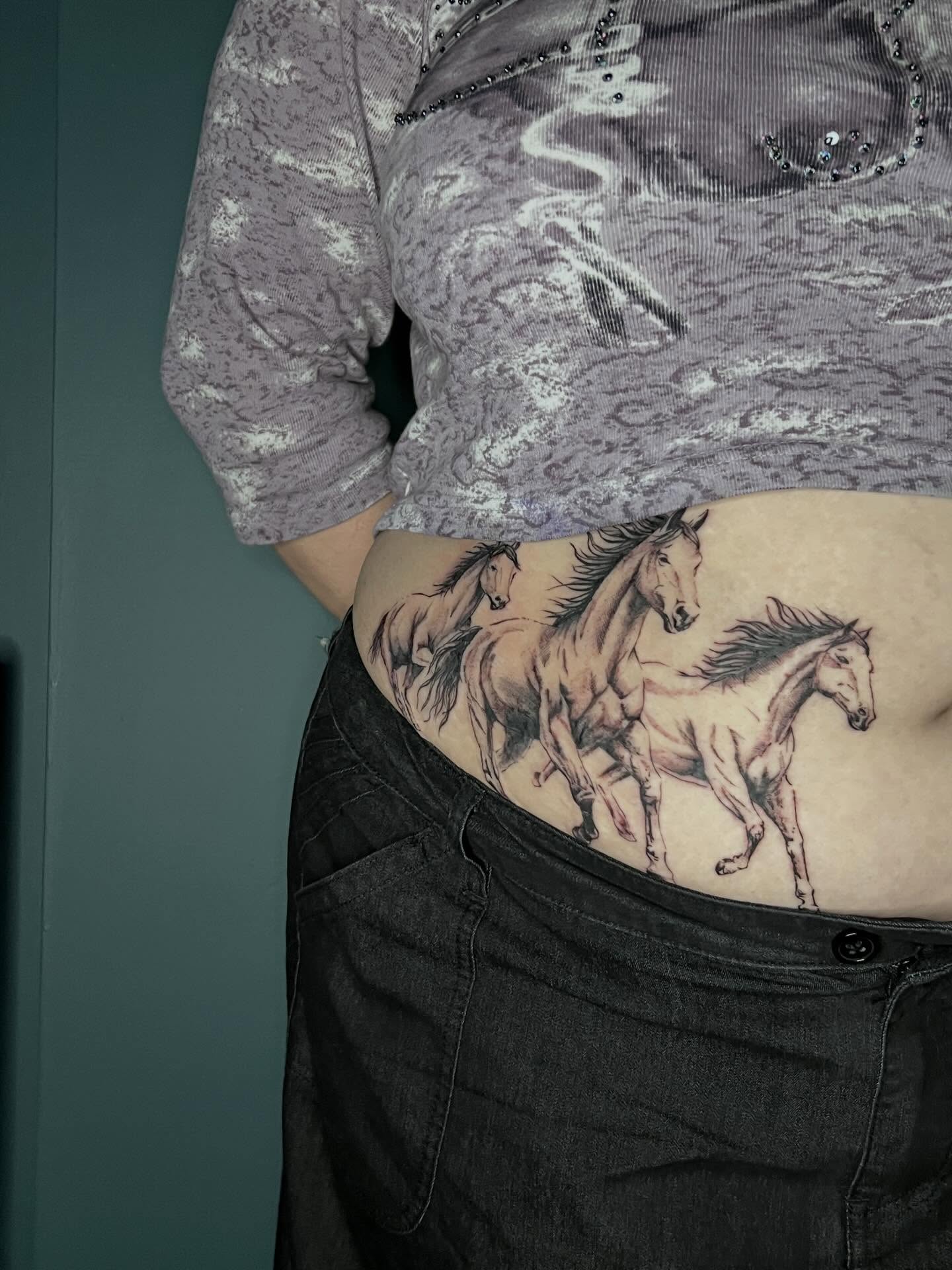 Horses black and grey tattoo on the torso by Callie πͺ