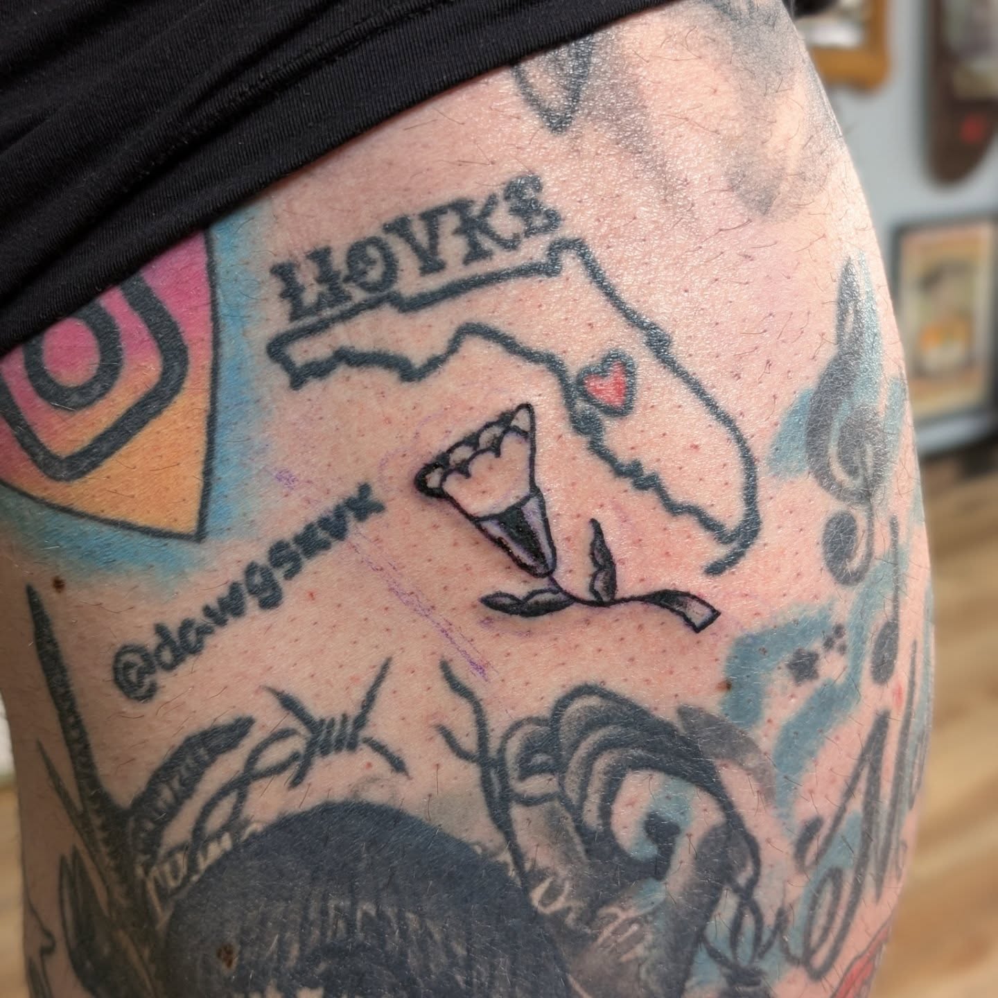 Map with lobster American traditional tattoo on the thigh by Jon Sedor