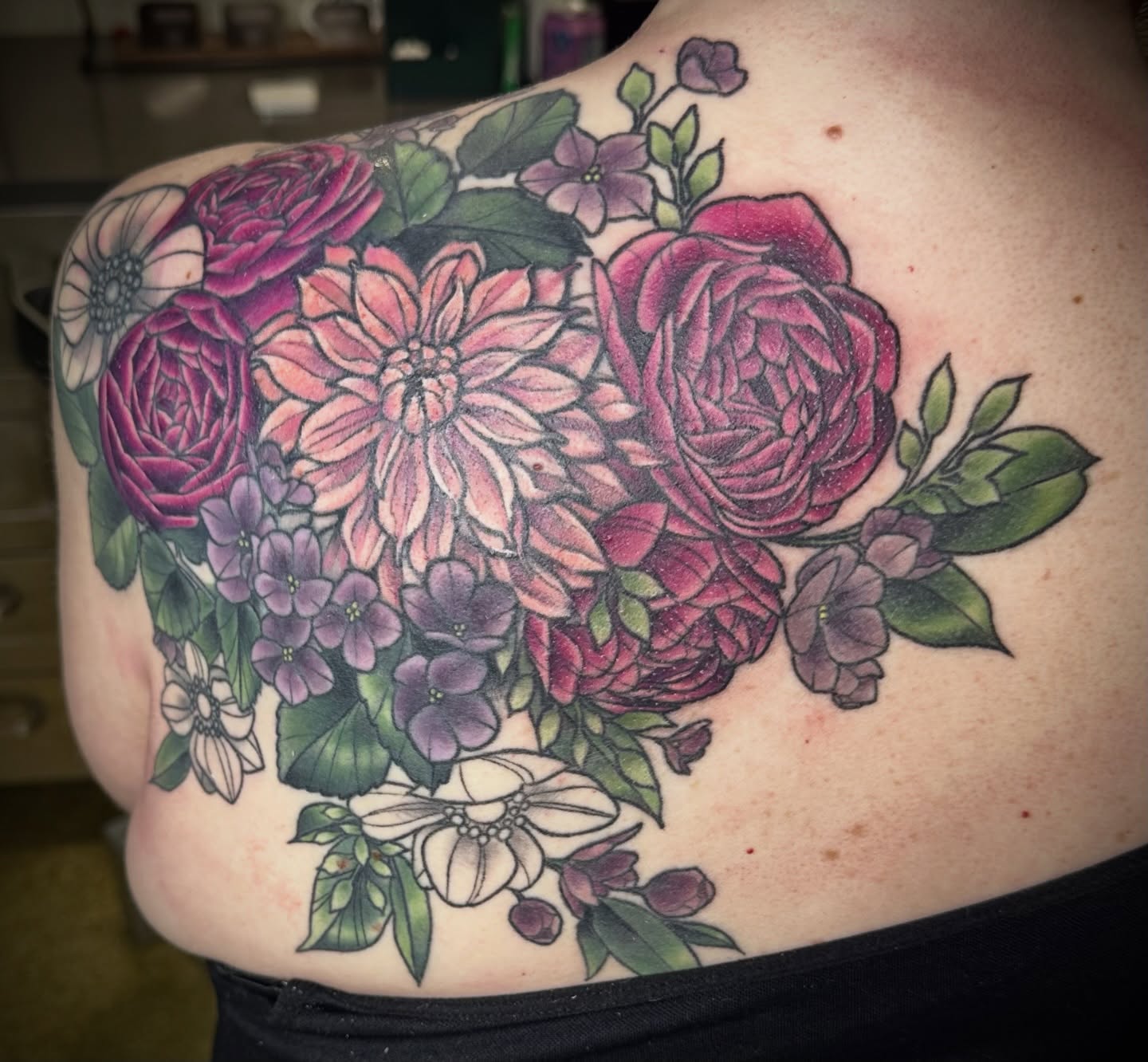 Floral bouquet realism tattoo on the shoulder by Katie Hutchins, Dayton, Ohio