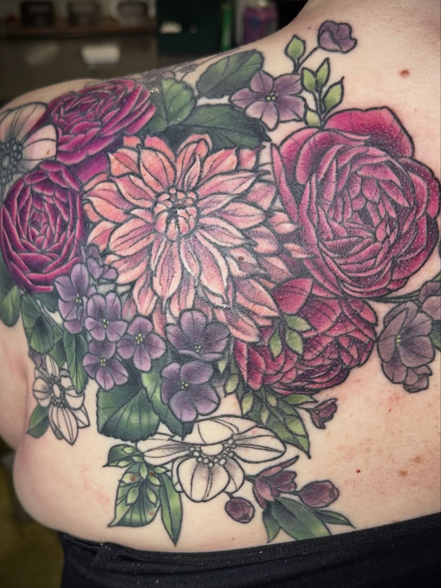 Floral bouquet new school tattoo on the shoulder by Katie Hutchins, Dayton, Ohio