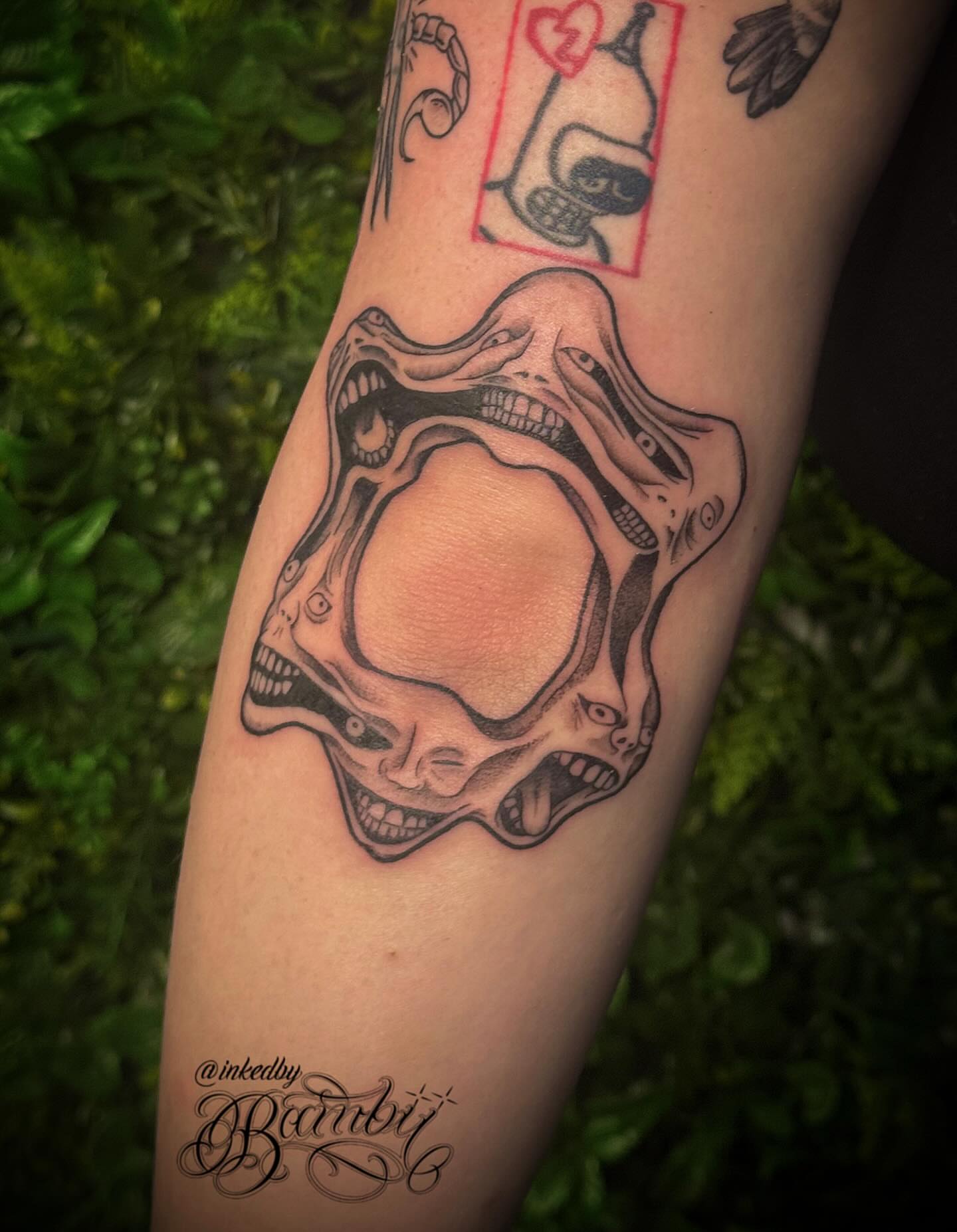 Skull black and grey tattoo on the forearm by Ember