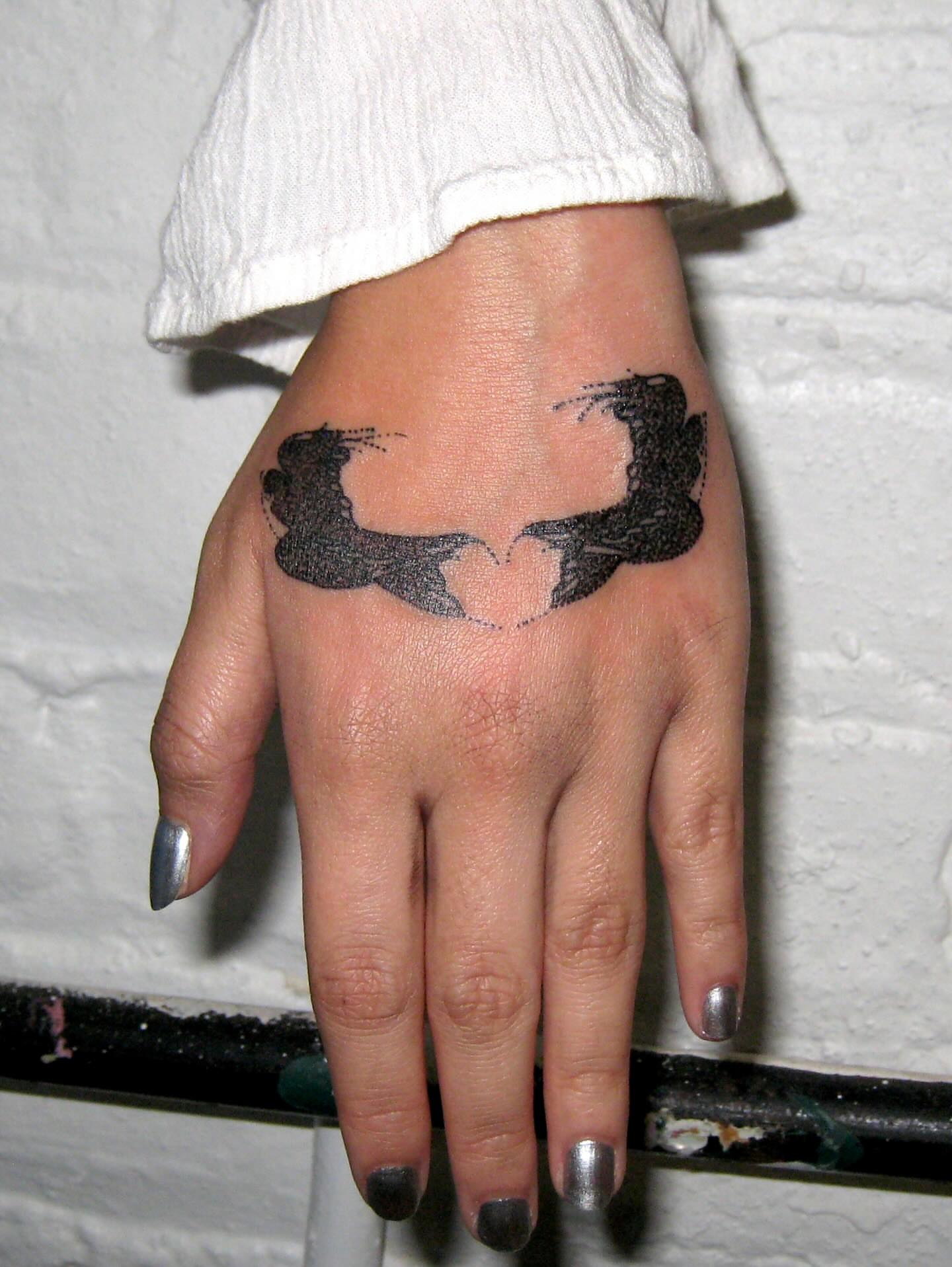 Skull dotwork tattoo on the hand by jonatan