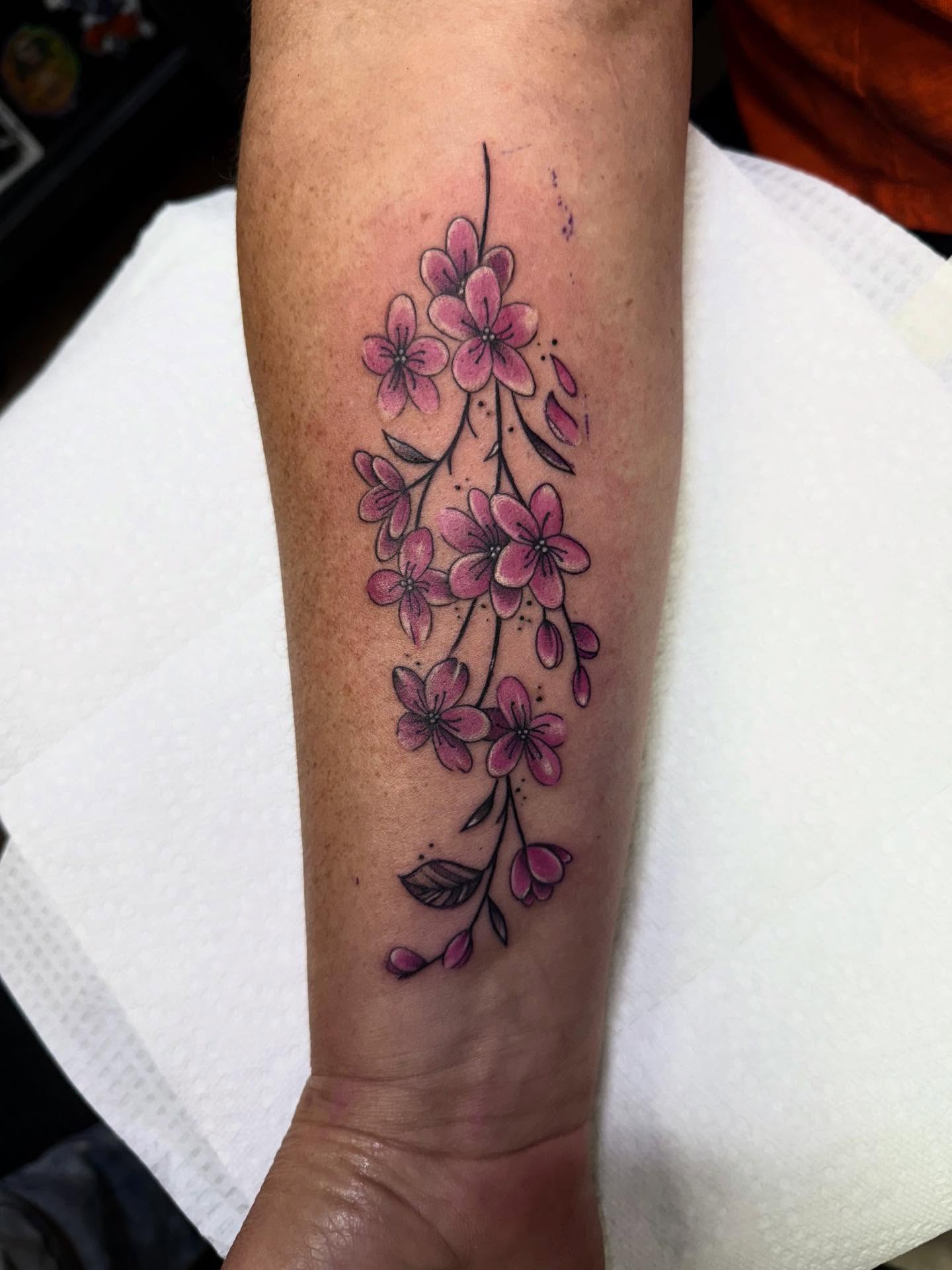 Cherry blossoms dotwork tattoo on the forearm by Jameson William Cowan