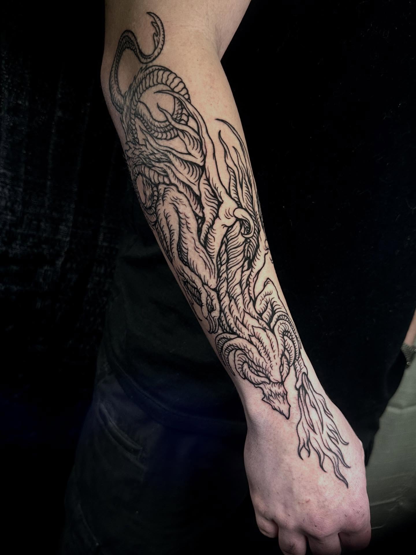 Dragon black and grey tattoo on the forearm by 𝕾𝖆𝖘𝖍𝖆 𝖂𝖔𝖑𝖆𝖓𝖉