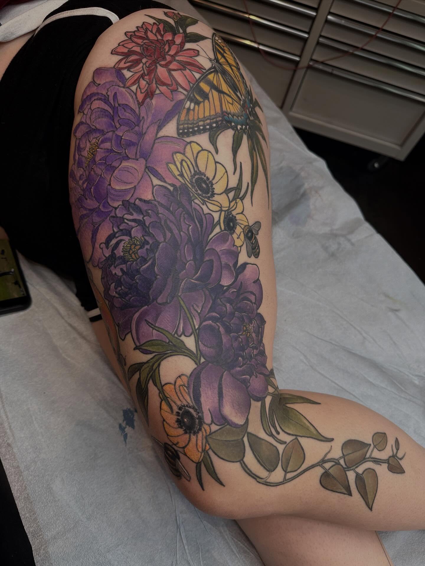 Floral bouquet new school tattoo on the forearm by Rachael Shelly