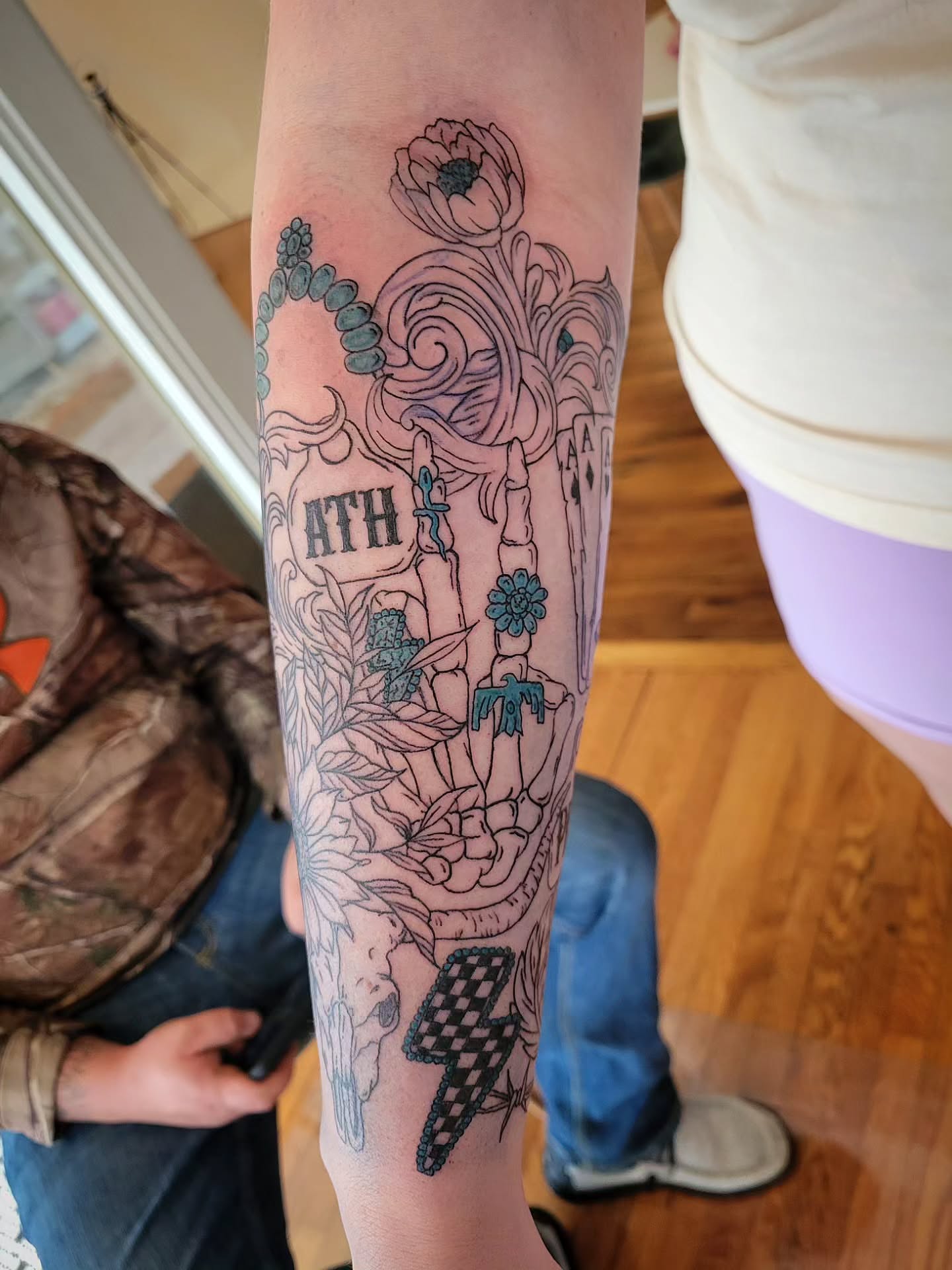 Floral arrangement American traditional tattoo on the forearm by Solstice Tattoos by Savannah Sadler (future, Salisbury, North Carolina