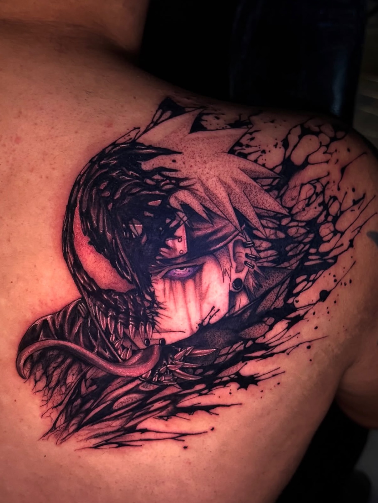 Anime character anime tattoo on the shoulder by Aiden Madrigal