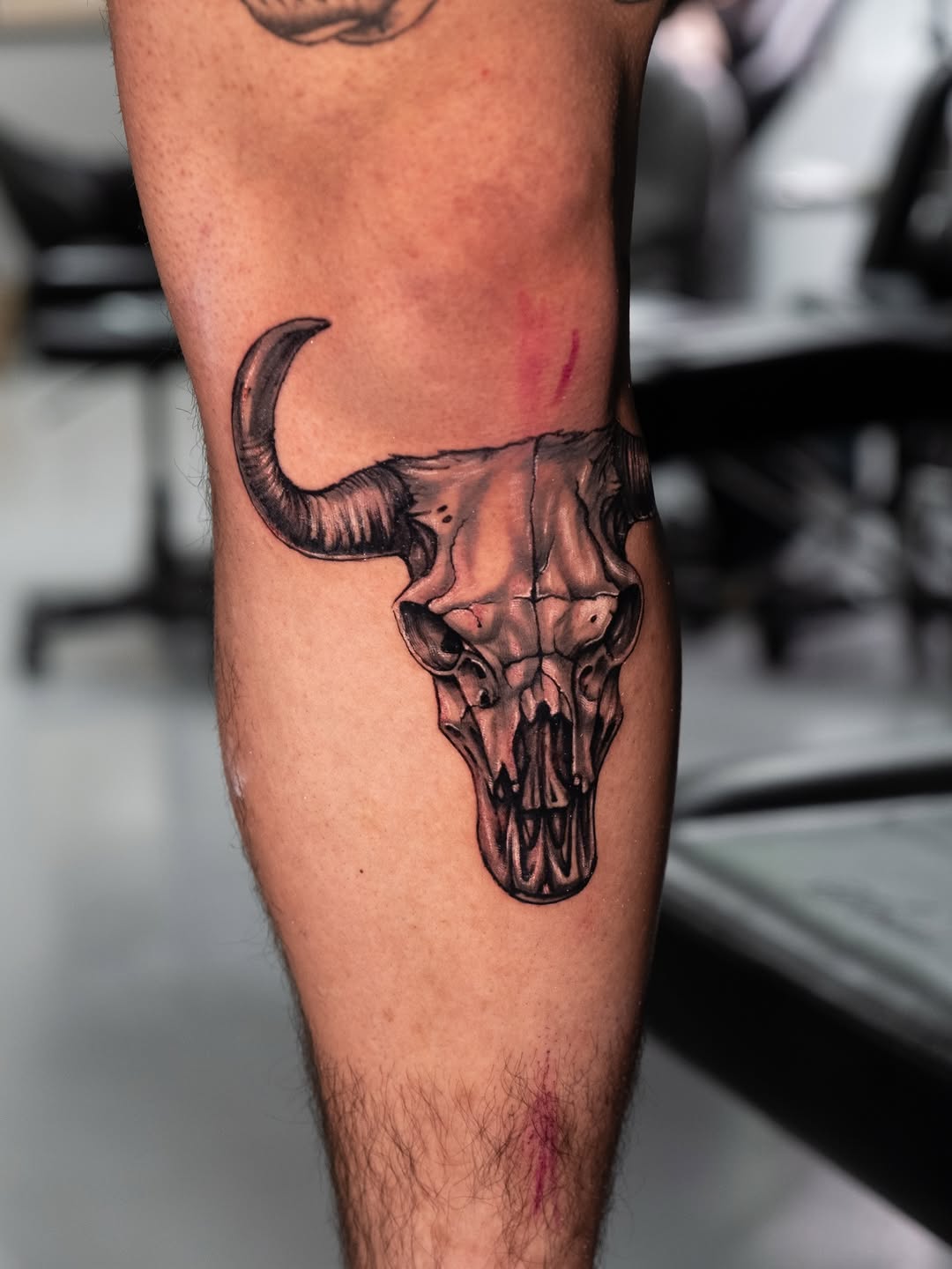 Tattoo by @eriktats13 — realism, black_and_grey