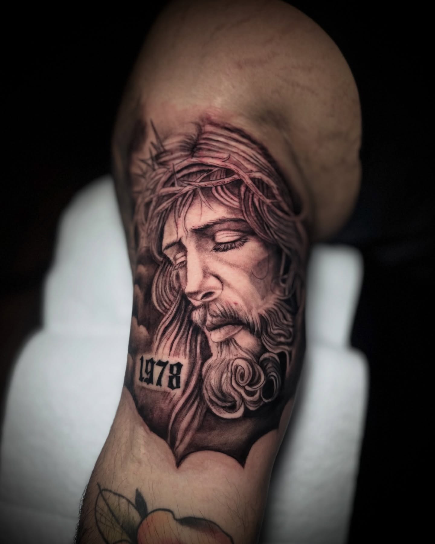 Religious figure realism tattoo on the forearm by Andres Calvo🇺🇸🇨🇴