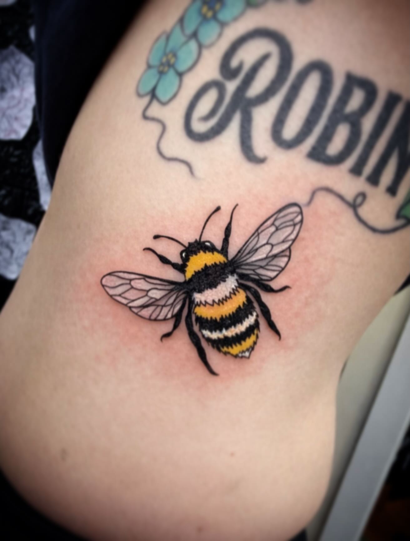 Bee realism tattoo on the thigh by Kraken ink Tattoo, San Francisco, California