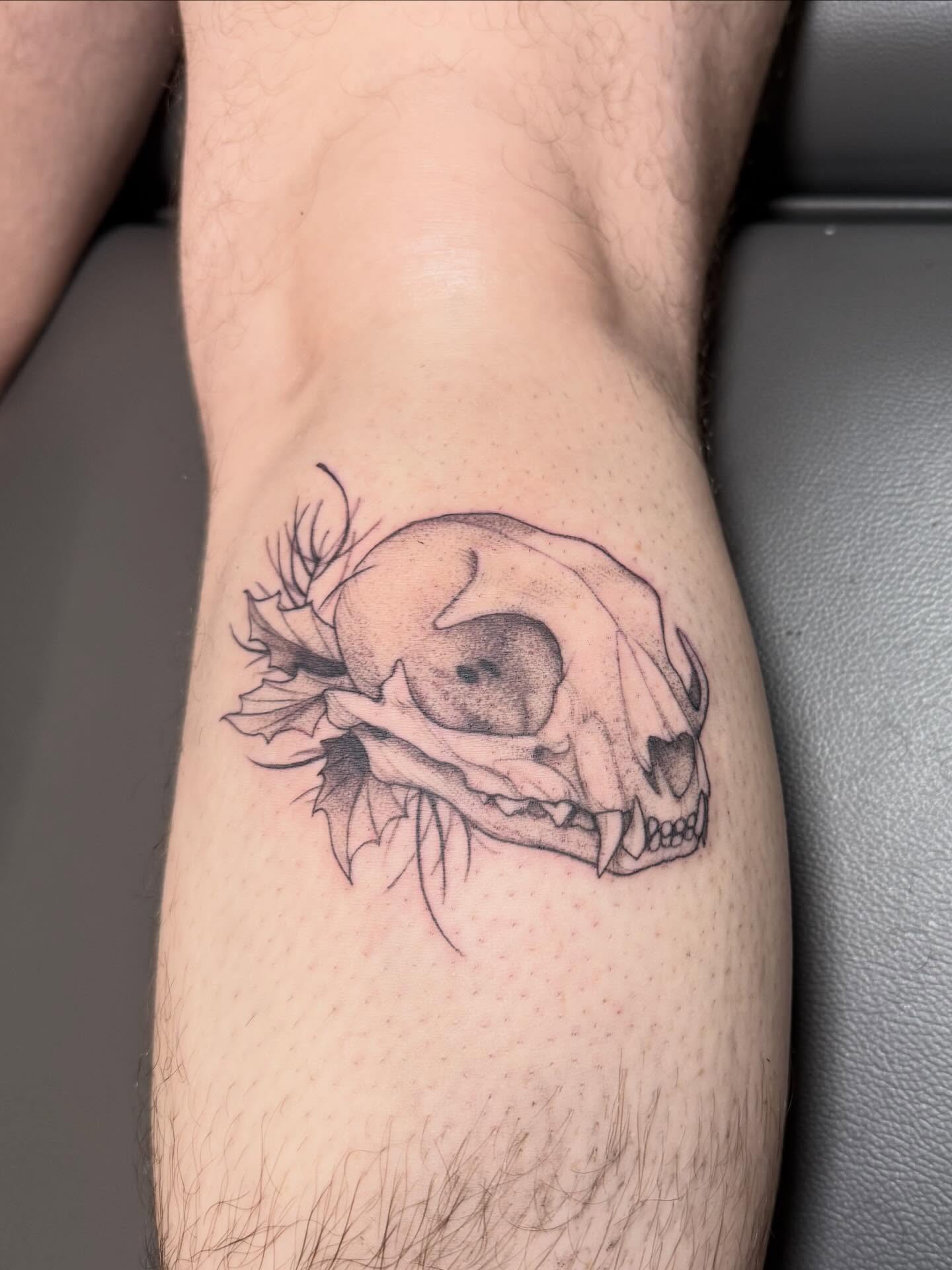 Skull dotwork tattoo on the forearm by Peter Harren