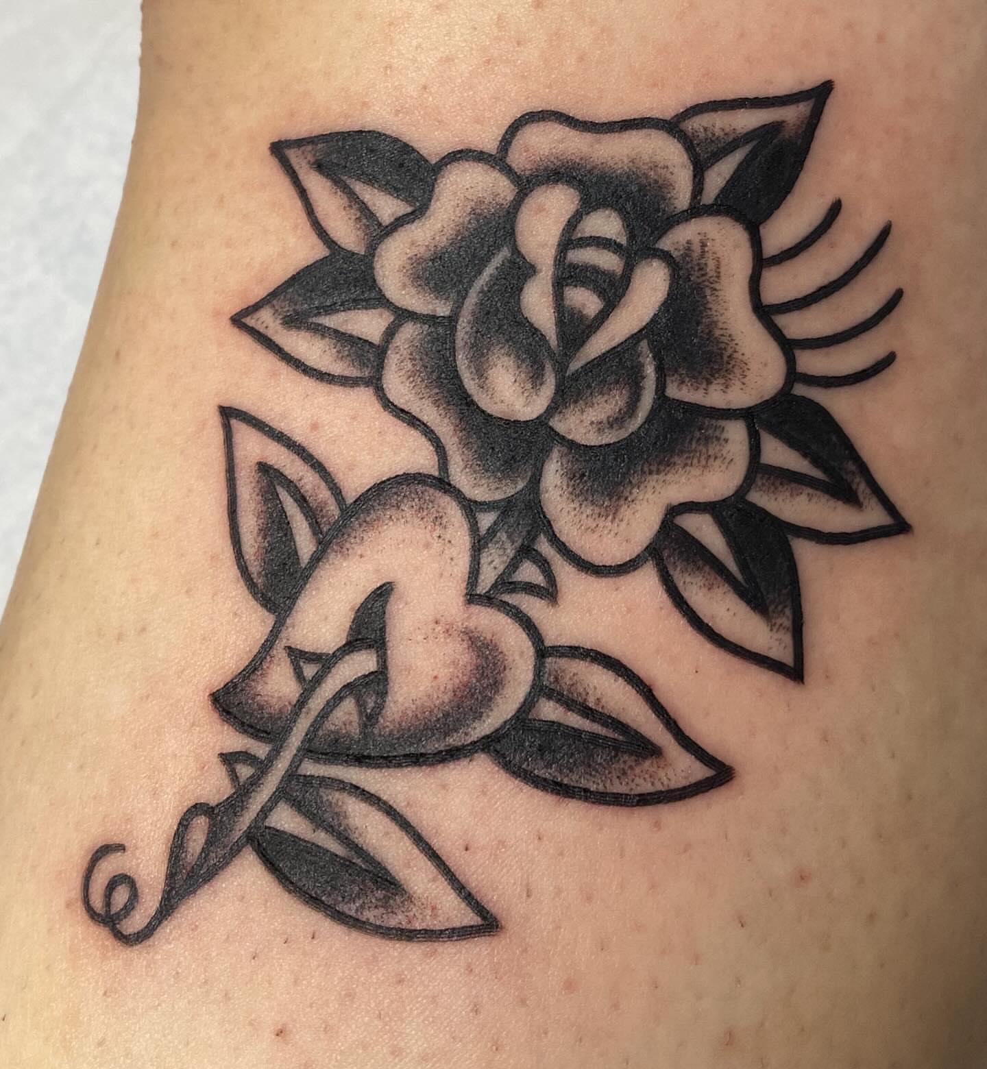 Rose American traditional tattoo on the thigh by Kiera ❤️‍🔥