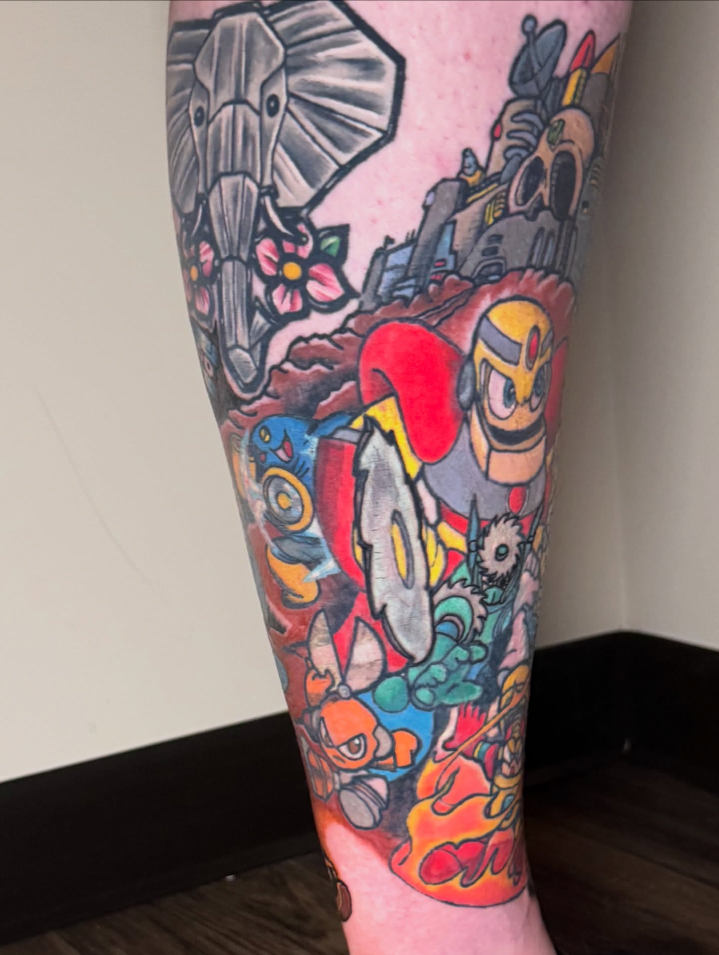 Megaman new school tattoo on the forearm by Bob Howdy