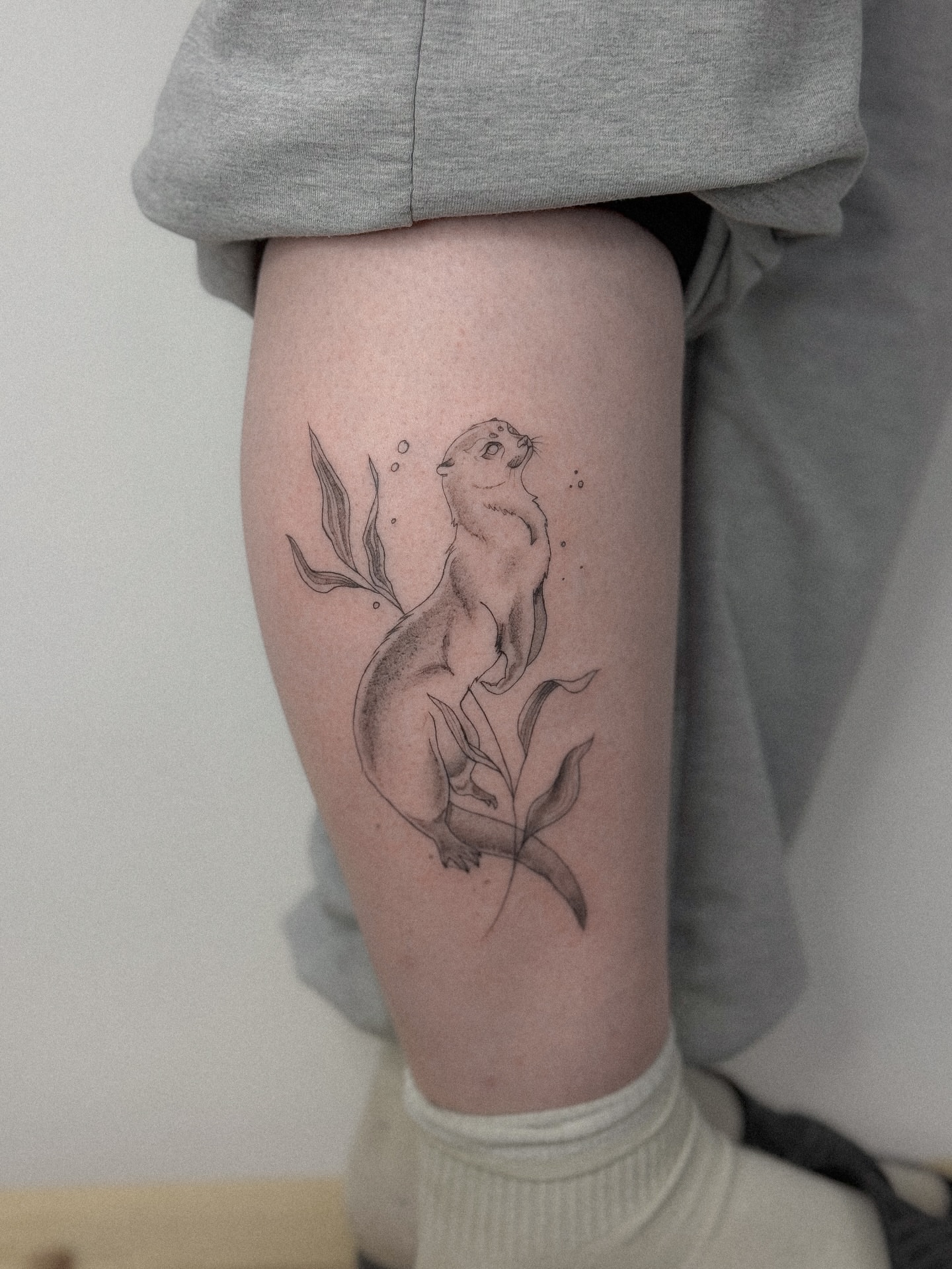 Tattoo by @romanova.skinart — black_and_grey