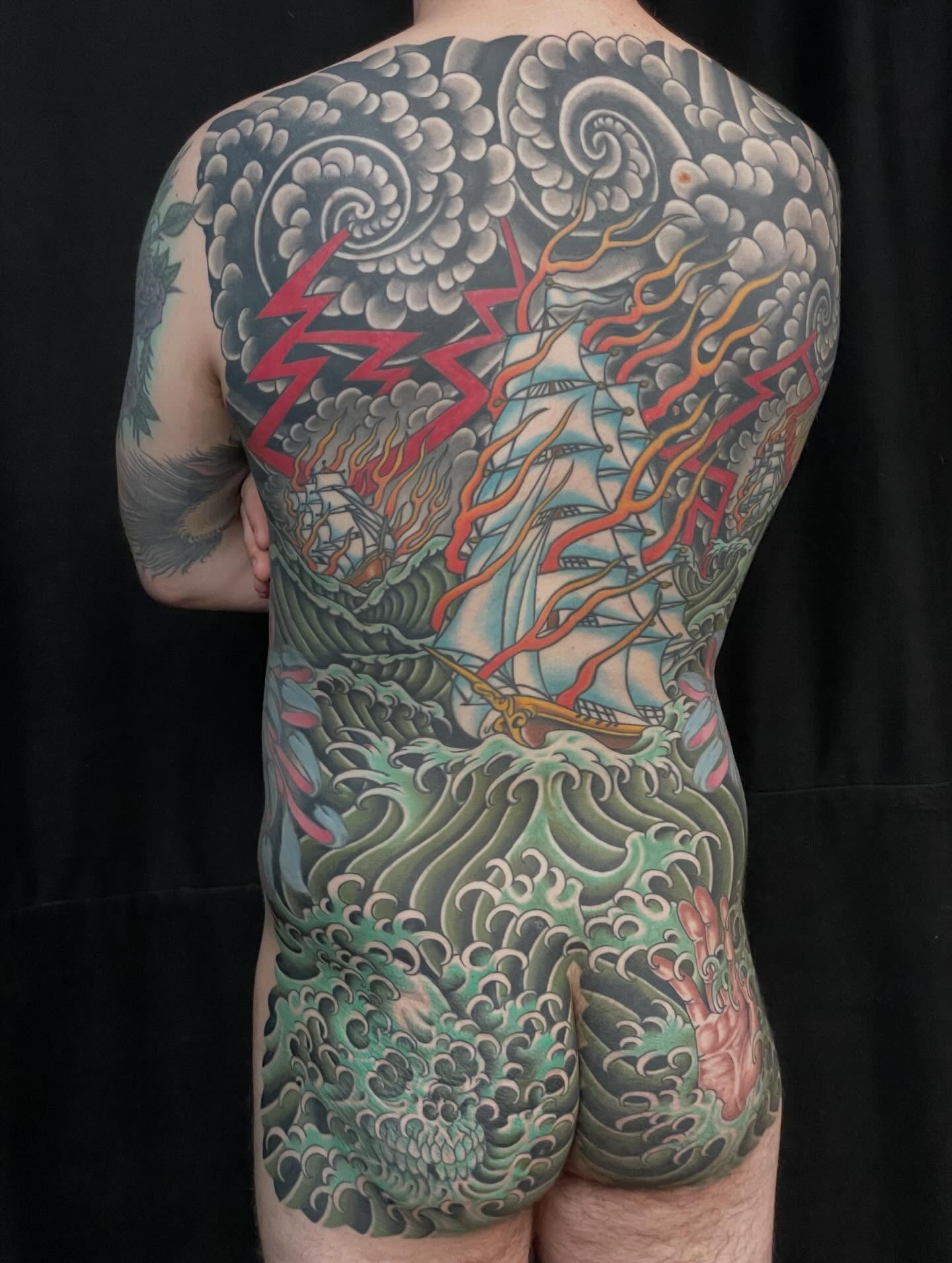 Stormy sea and ship japanese irezumi tattoo on the back by Haley McMahon