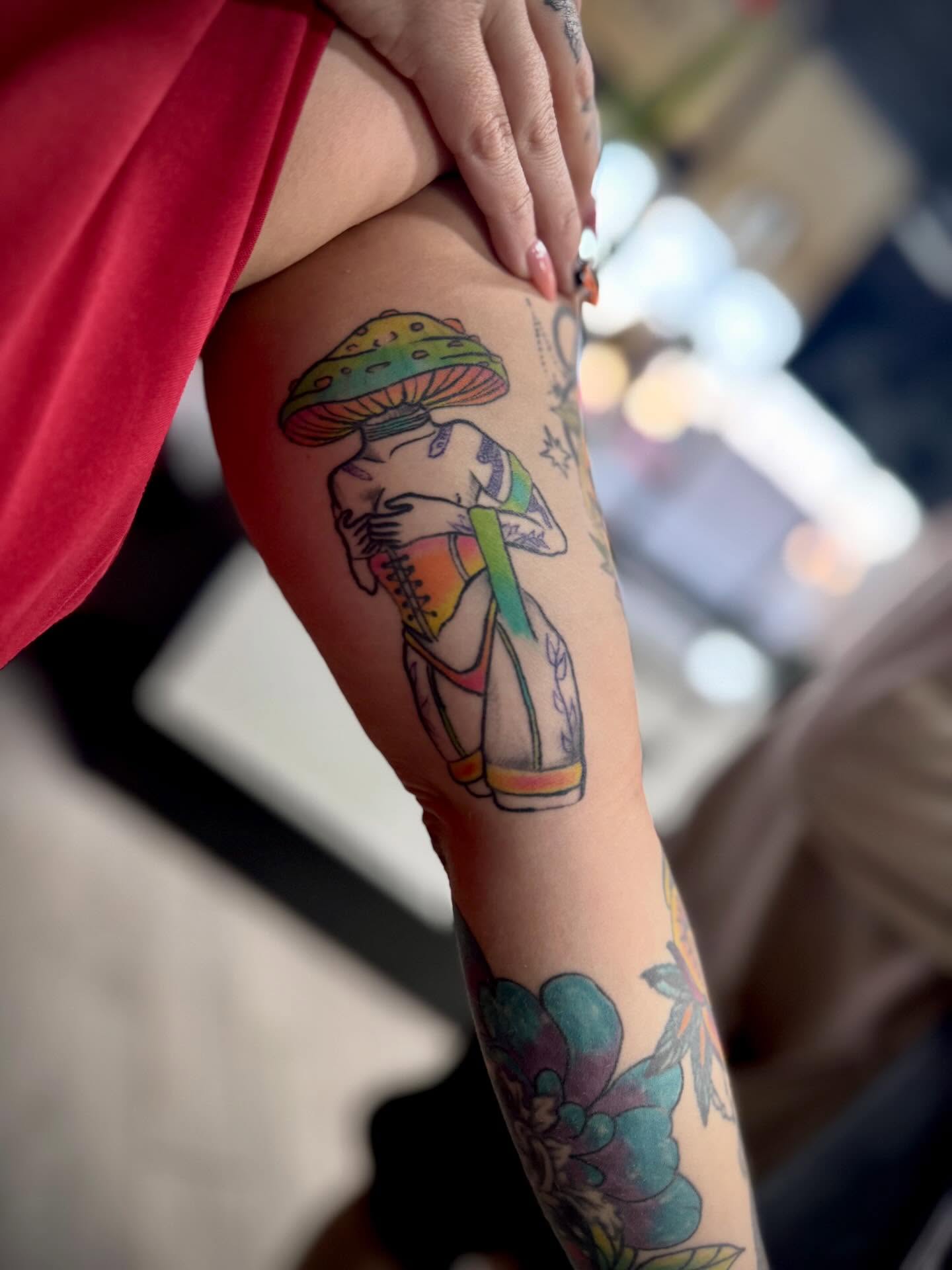 Mushroom woman illustrative tattoo on the forearm by Katelyn Arnold