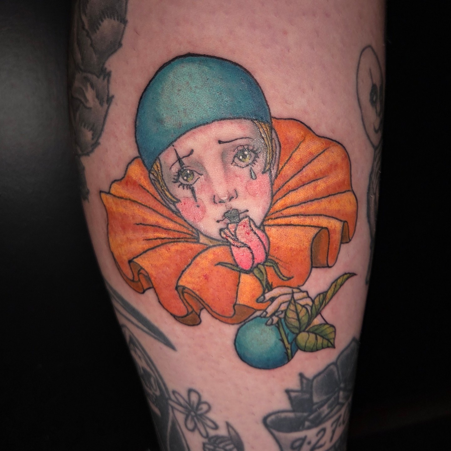 Clown girl realism tattoo on the forearm by Trinity Renee