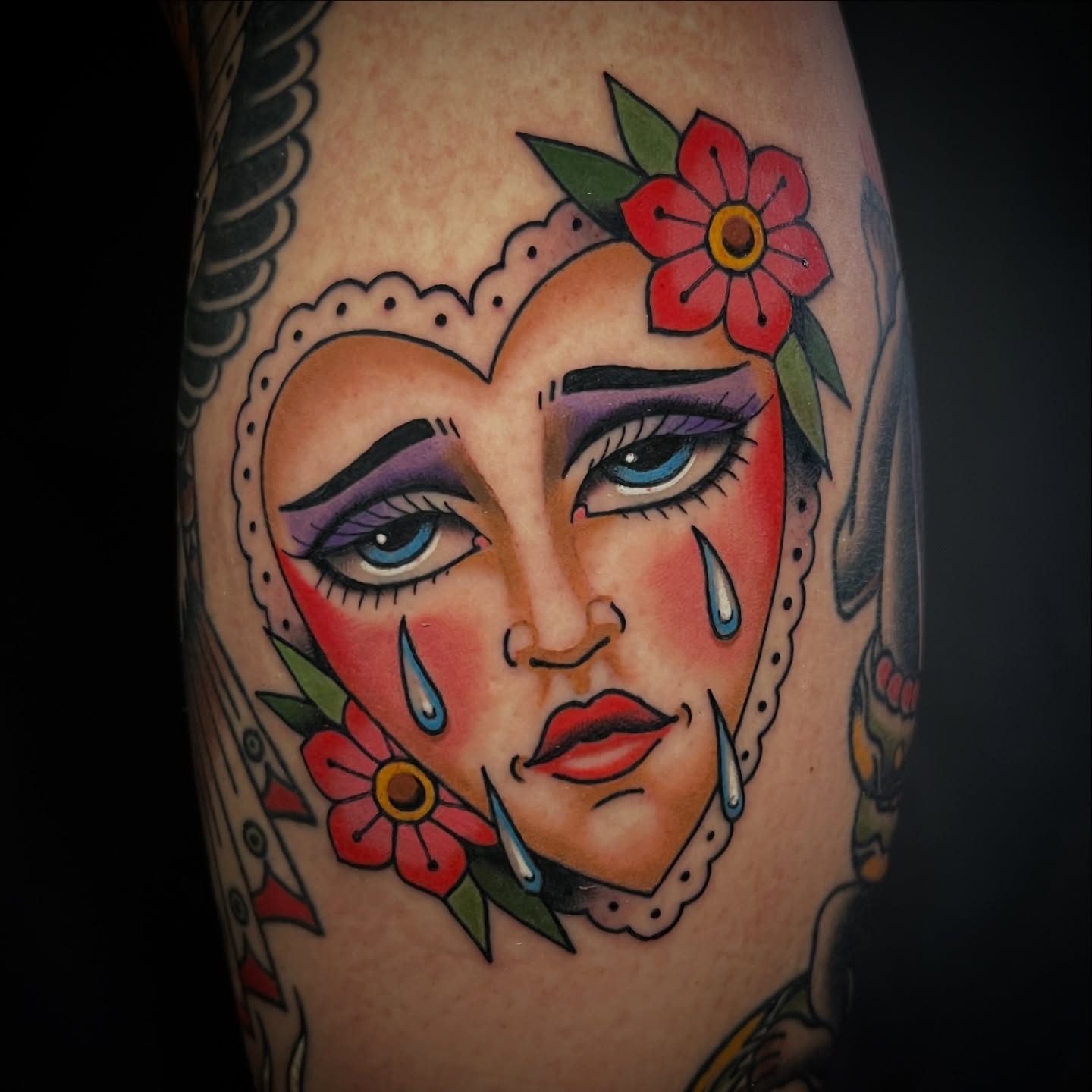 Woman's face American traditional tattoo on the forearm by Michael Munter, Philadelphia, Pennsylvania
