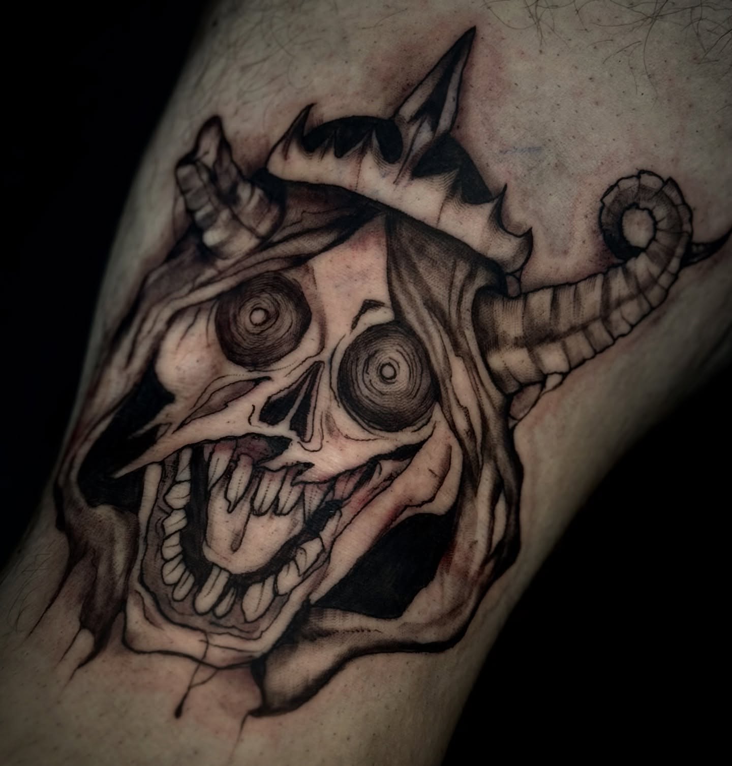 Demon skull dark realism tattoo on the forearm by 𝙹𝙰𝚉𝚉 𝙲𝙷𝙰𝙾