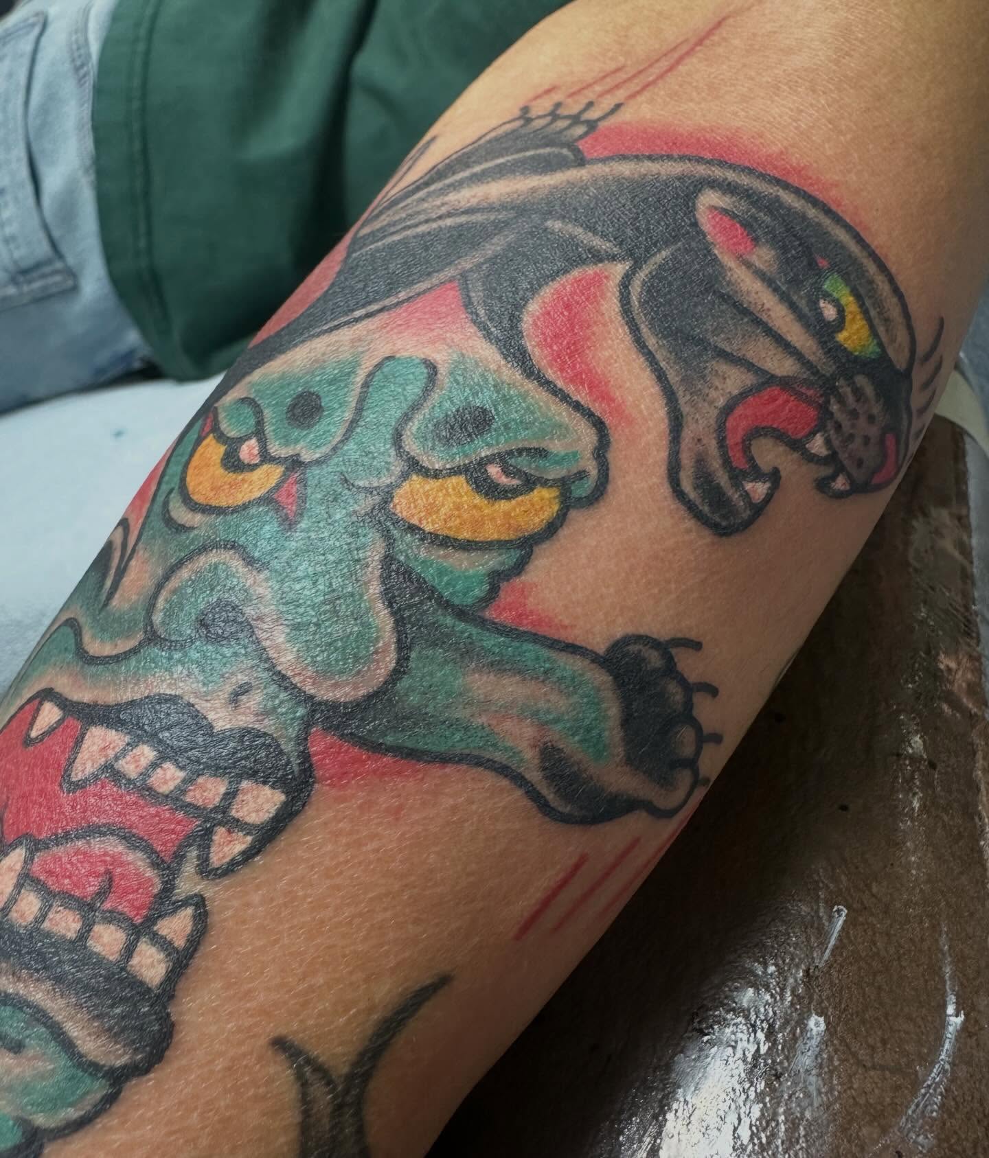 Panther American traditional tattoo on the forearm by Devin Spenny