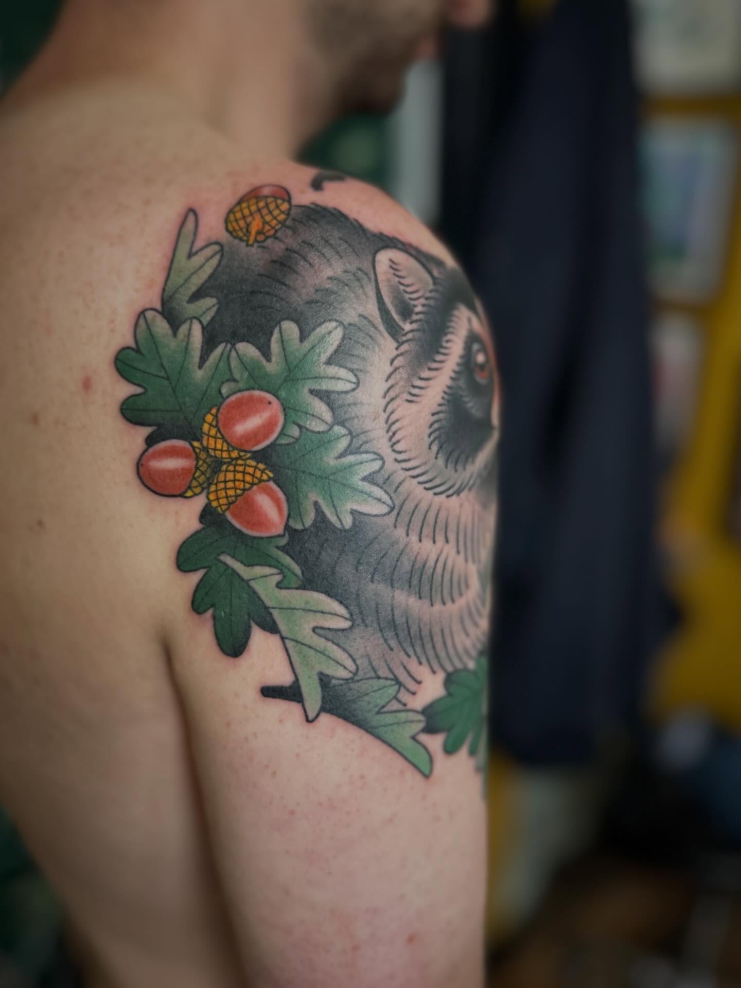 Owl and acorns American traditional tattoo on the shoulder by Megon Shore, Seattle, Washington