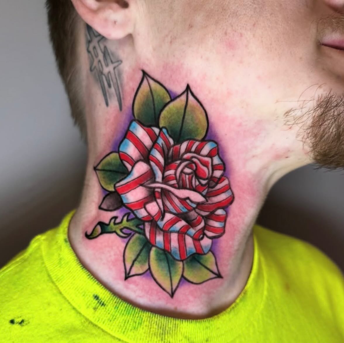 Striped rose American traditional tattoo on the neck by Shane Fowler, Massillon, Ohio