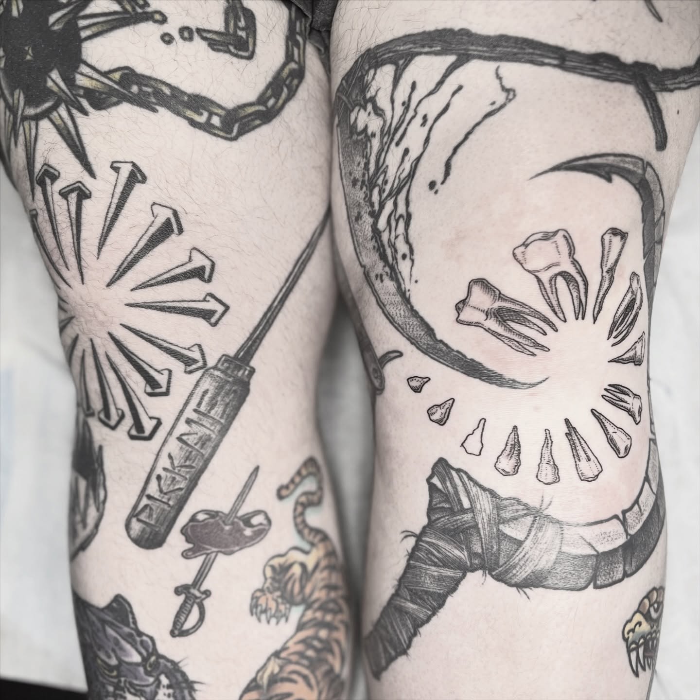 Skull black and grey tattoo on the forearm by Alex Santaloci
