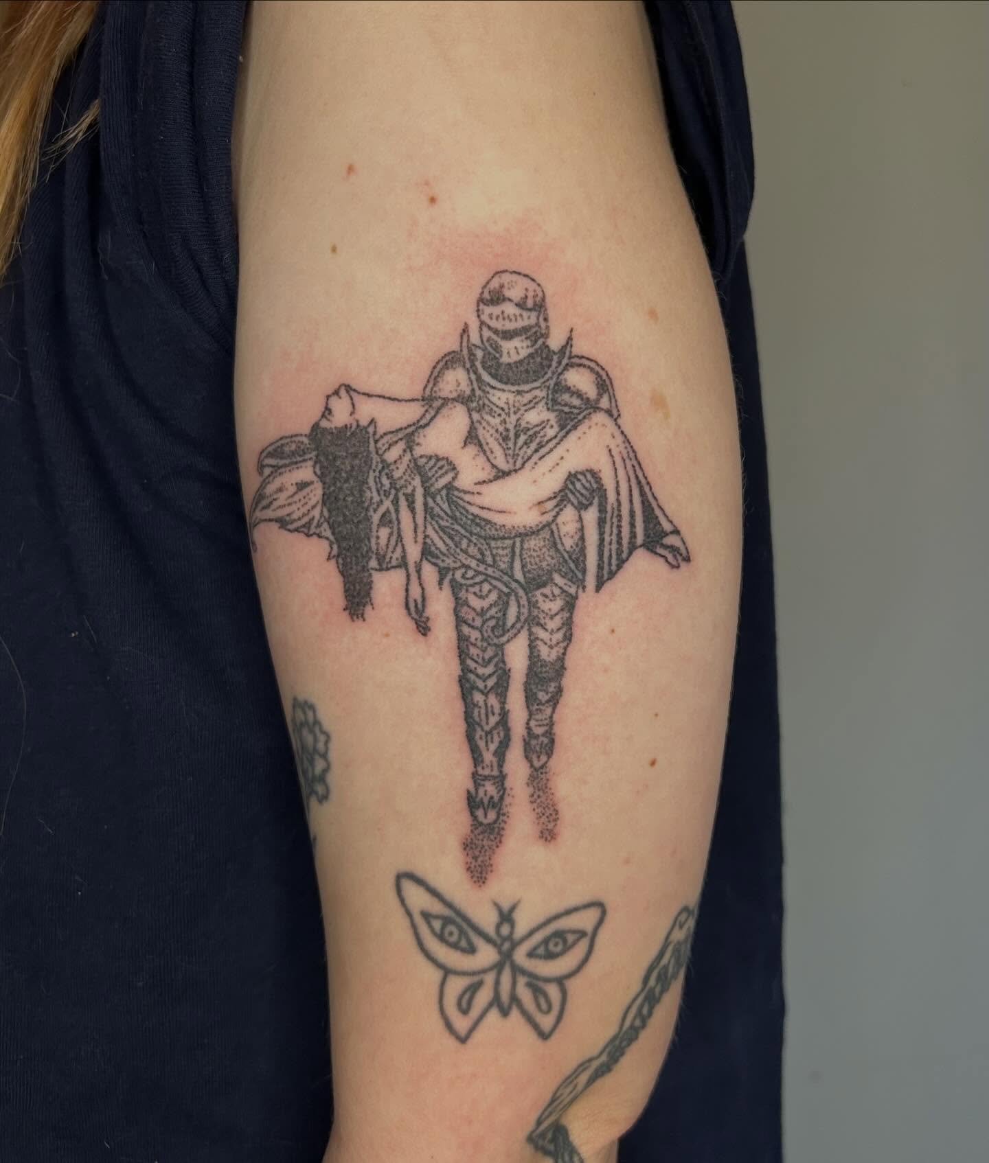 Armor-clad figure carrying a woman dotwork tattoo on the forearm by ˙⋆✮⋆˙‧₊˚✧ sophie ✧˚₊‧˙⋆✮⋆˙