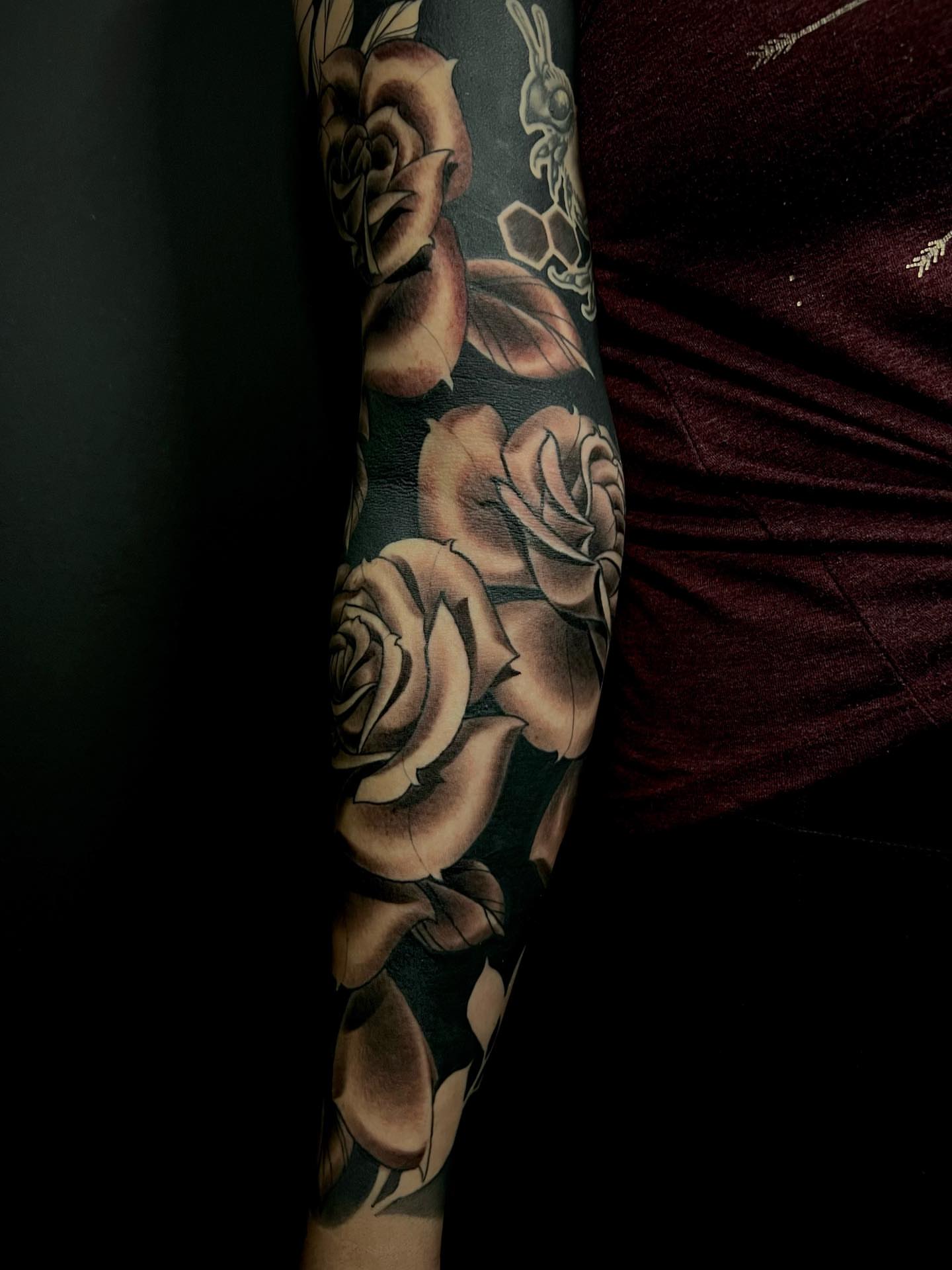 Roses realism tattoo on the forearm by Byron Winkelman, Gilbert, Arizona