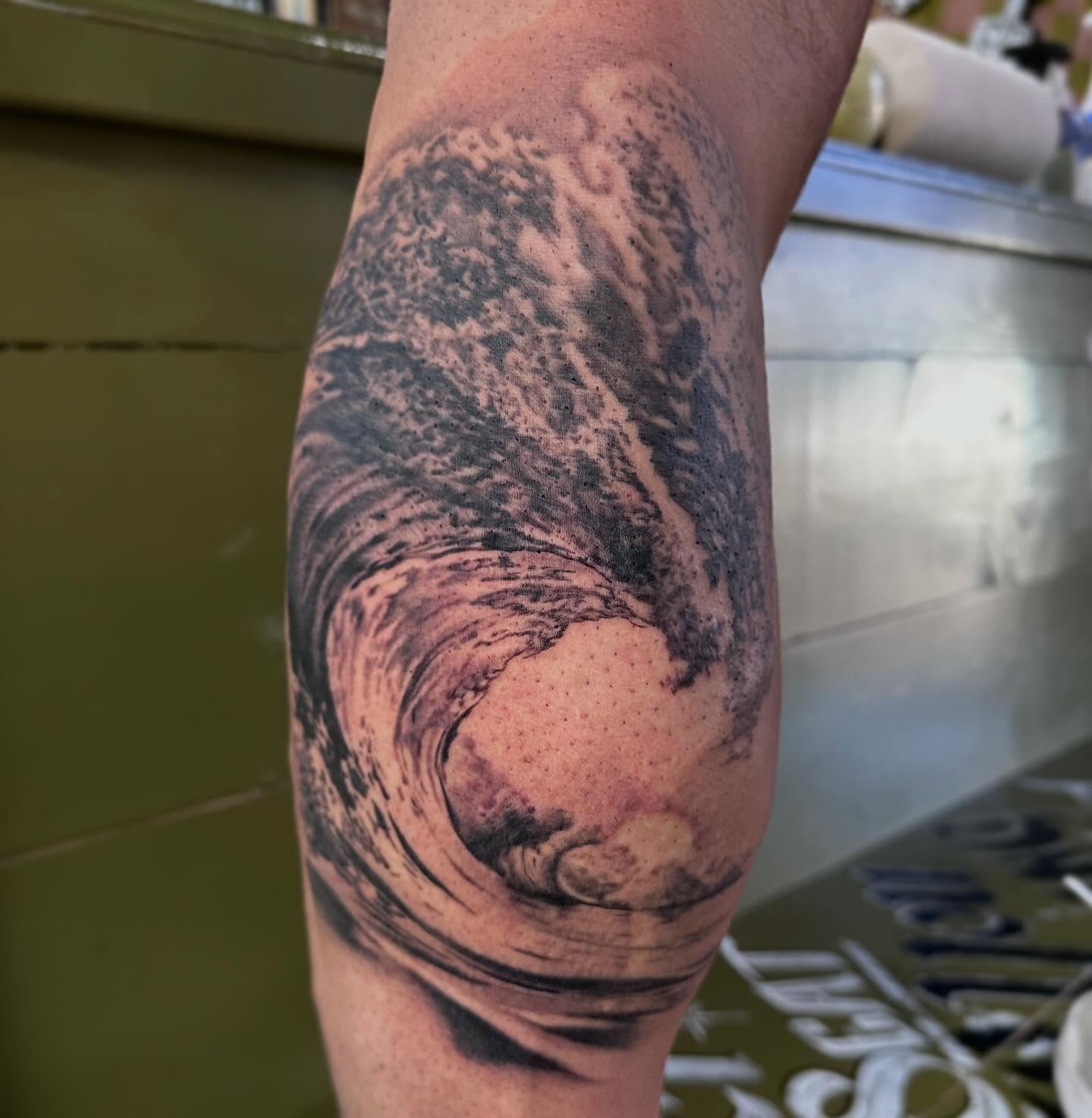 Wave realism tattoo on the forearm by Dustin Clark, Dayton, Ohio