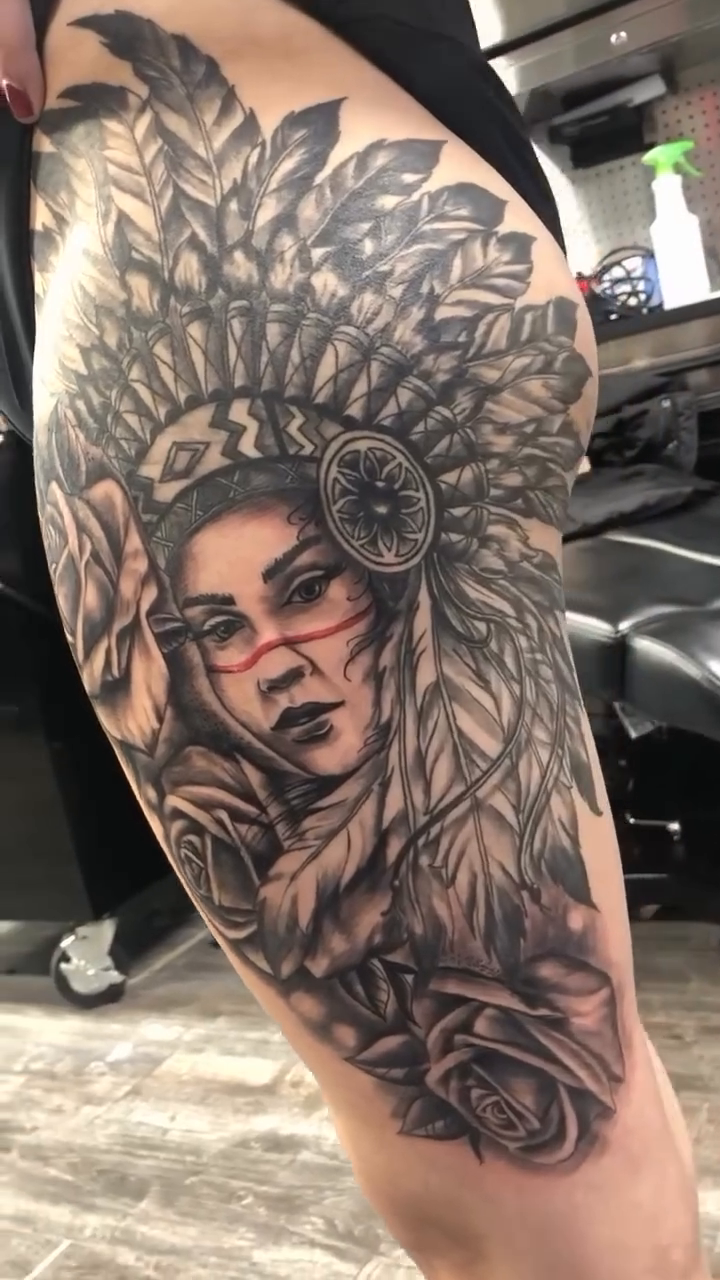 Native American woman with headdress realism tattoo by Shaunboweink
