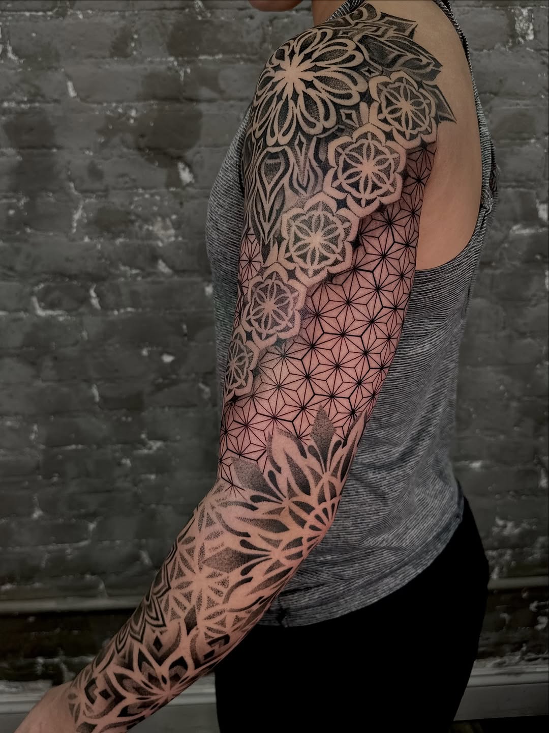 Tattoo by @dayana_tattooartist — geometric, dotwork