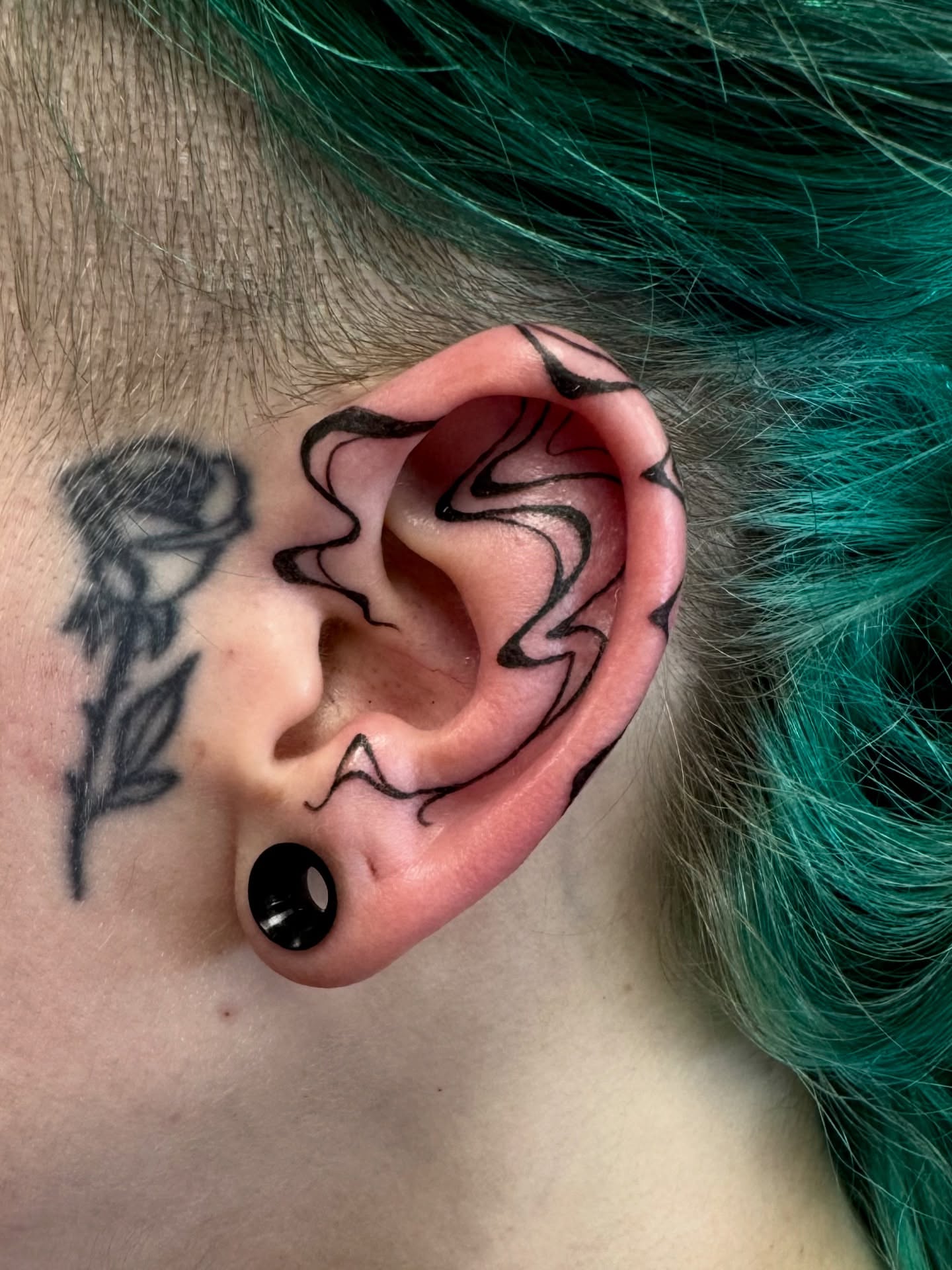 Swirls black and grey tattoo by Samantha Jane