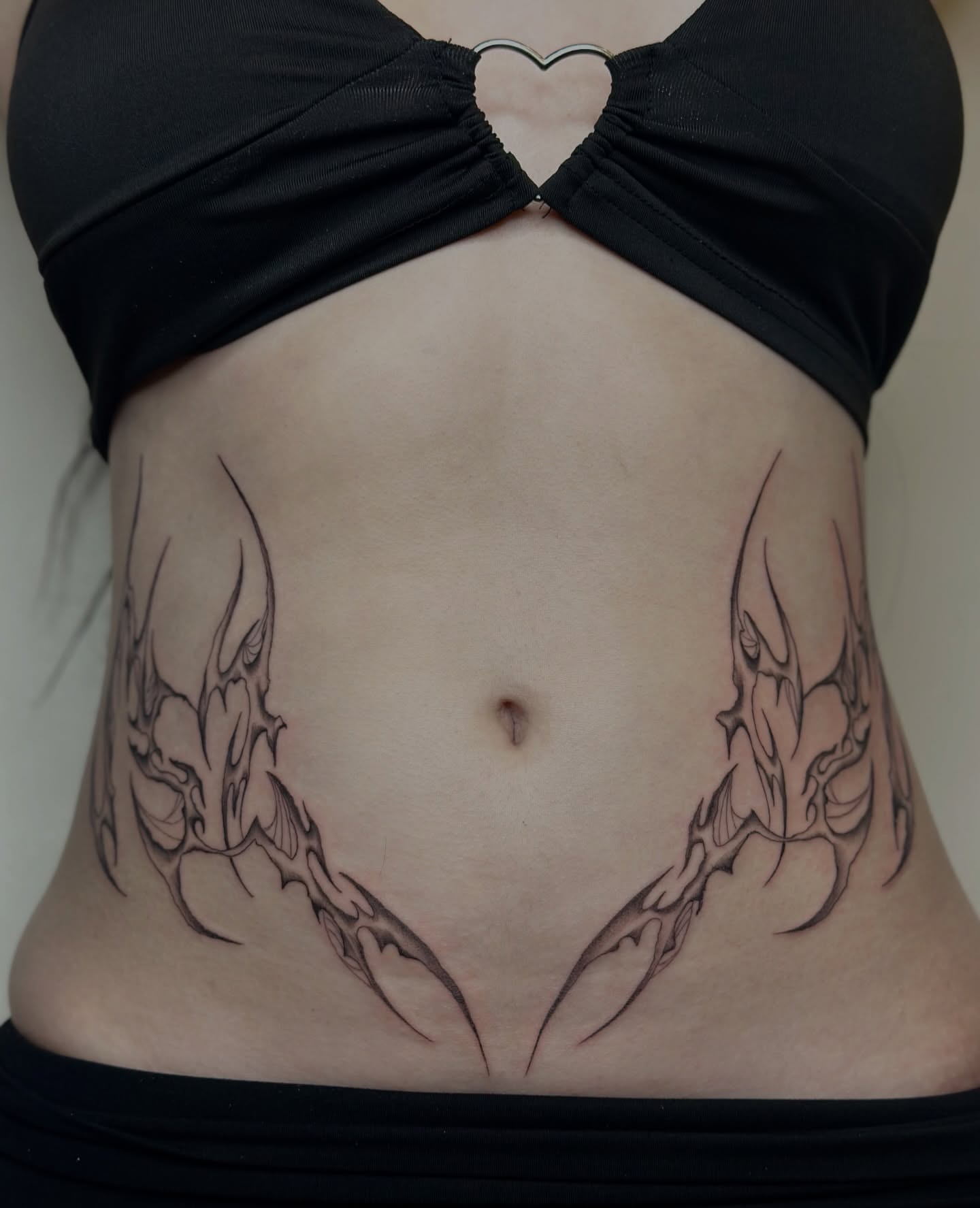Scorpion black and grey tattoo on the torso by Macy Rae