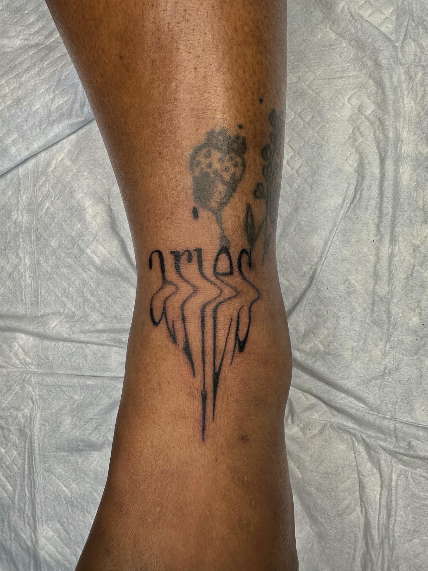 Rose black and grey tattoo on the forearm by J Valentin