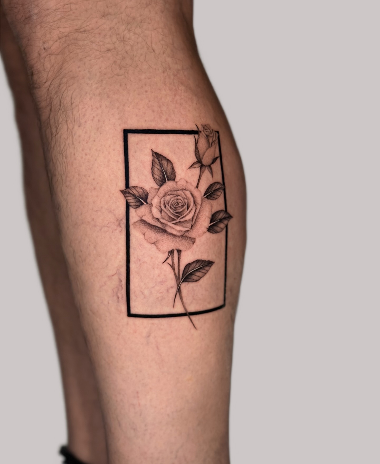 Rose black and grey tattoo on the thigh by Miami Tattoo Artist, Miami, Florida
