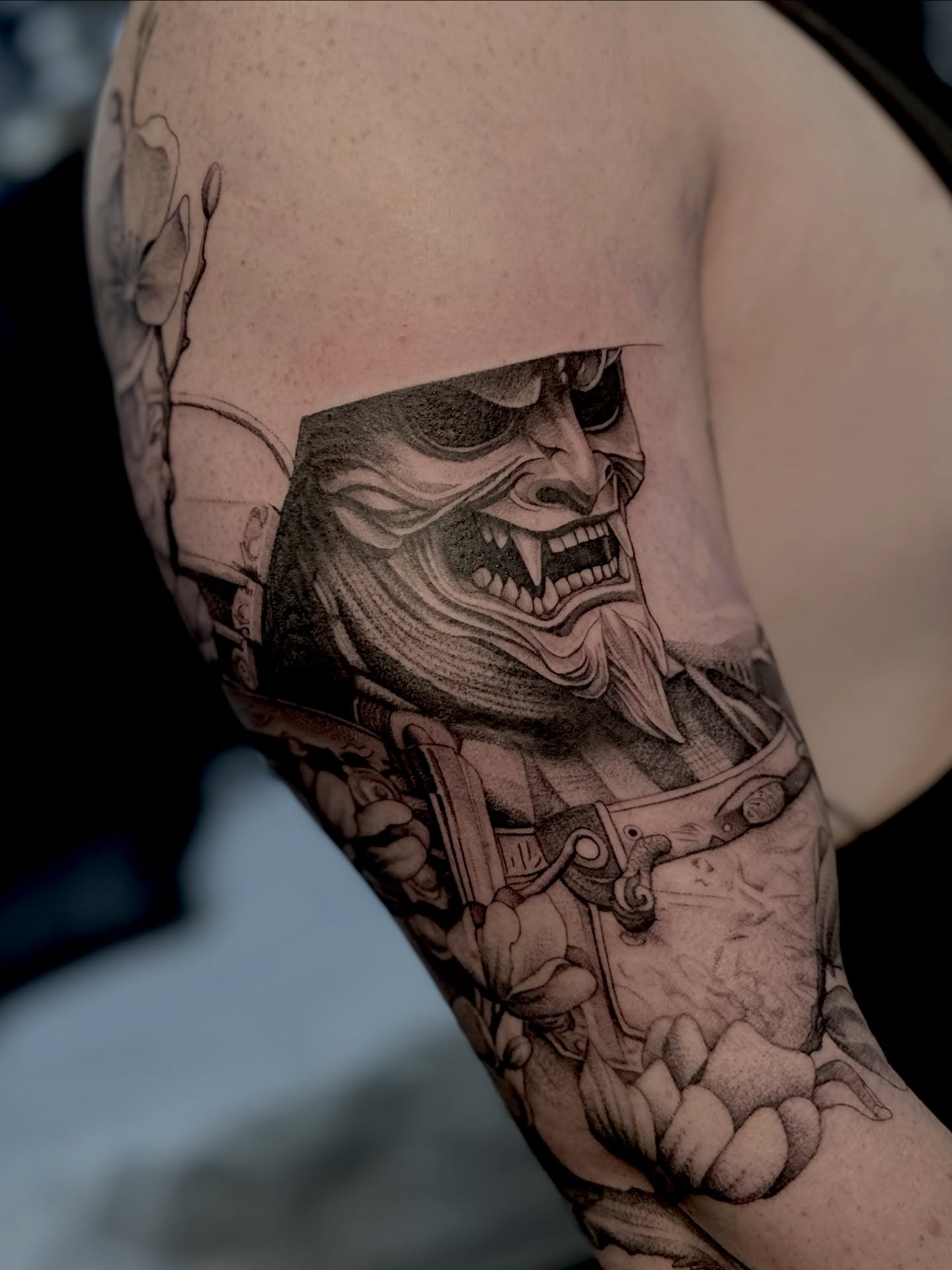 Japanese mask warrior realism tattoo on the forearm by Ghost