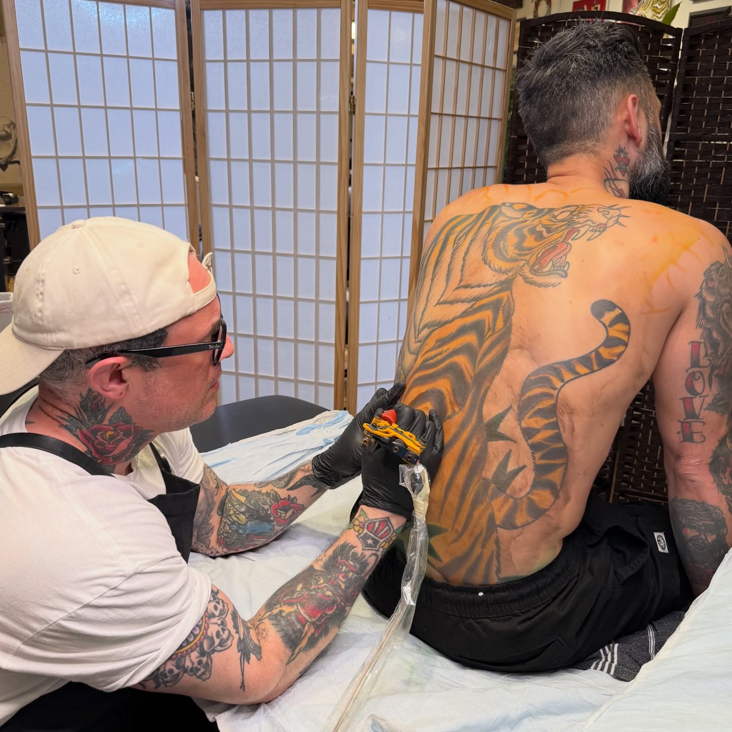 Tiger American traditional tattoo on the back by James Fernella, San Francisco, California