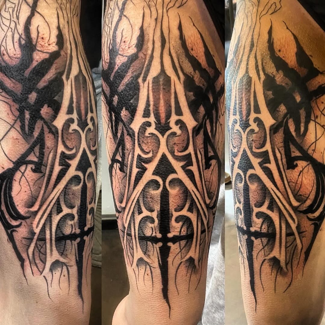 Abstract gothic design cyber sigilism tattoo on the forearm by Cody Wolfe