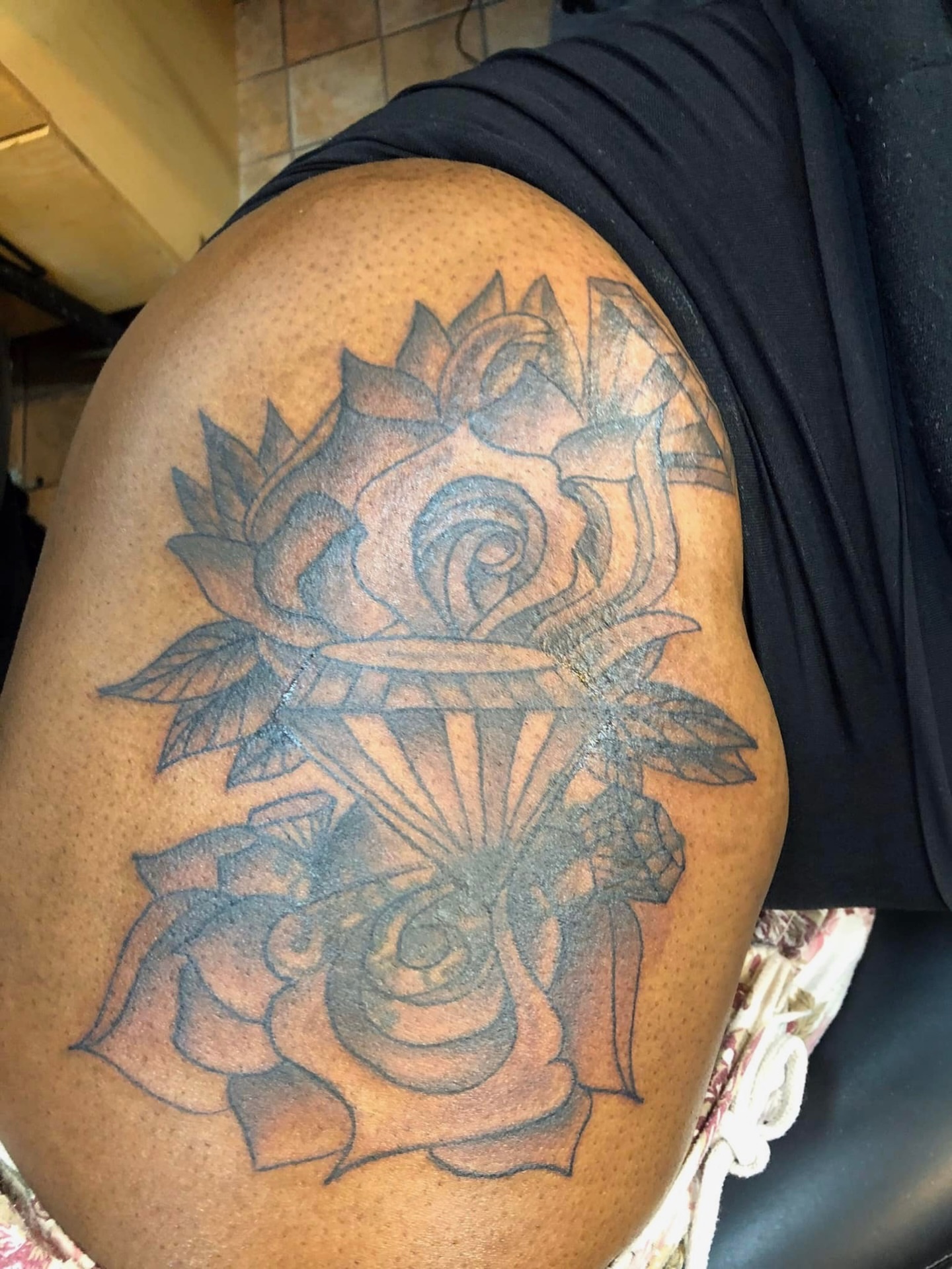 Roses black and grey tattoo on the thigh by @juiceinkythings