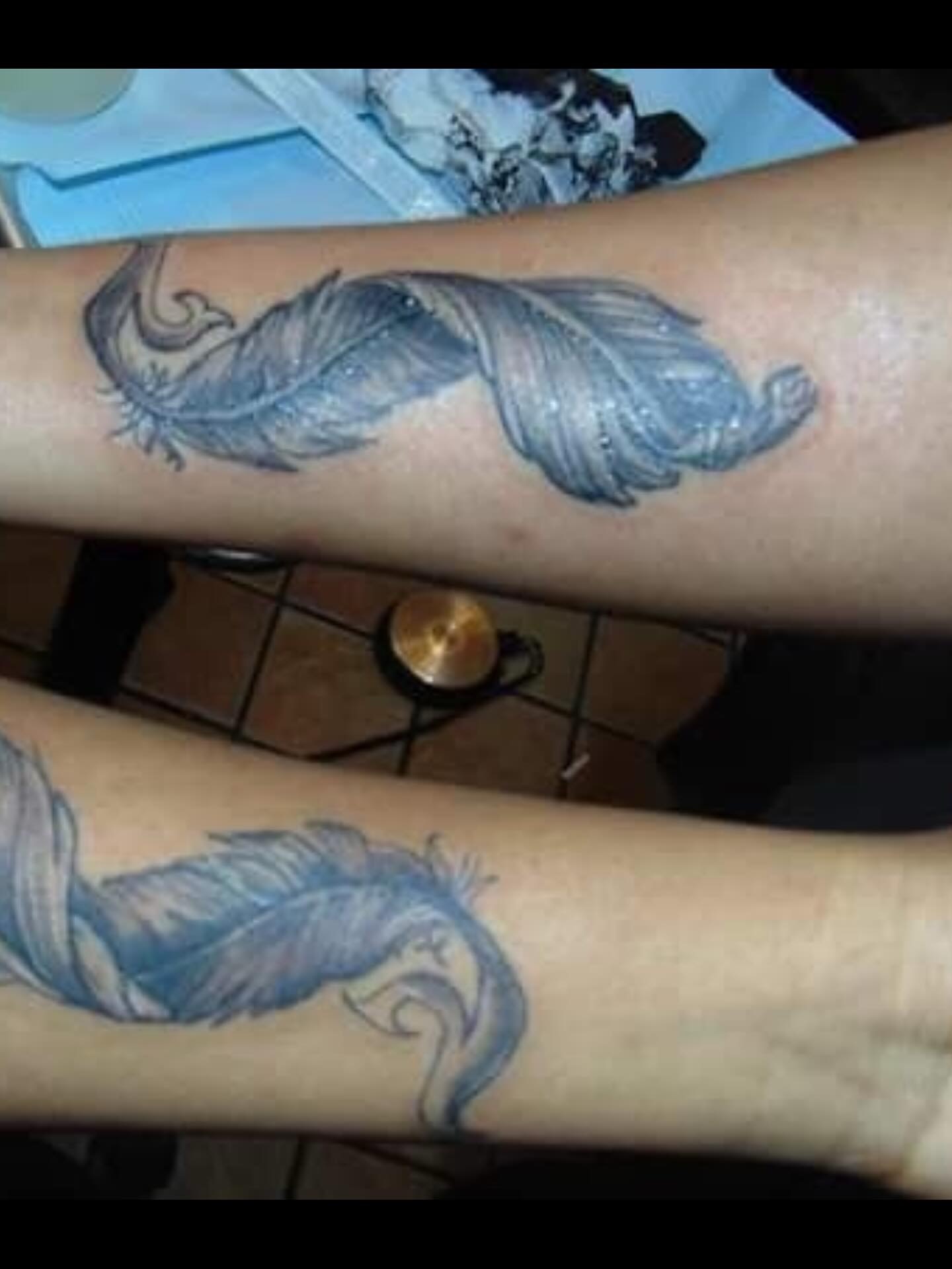 Feather realism tattoo on the forearm by @juiceinkythings