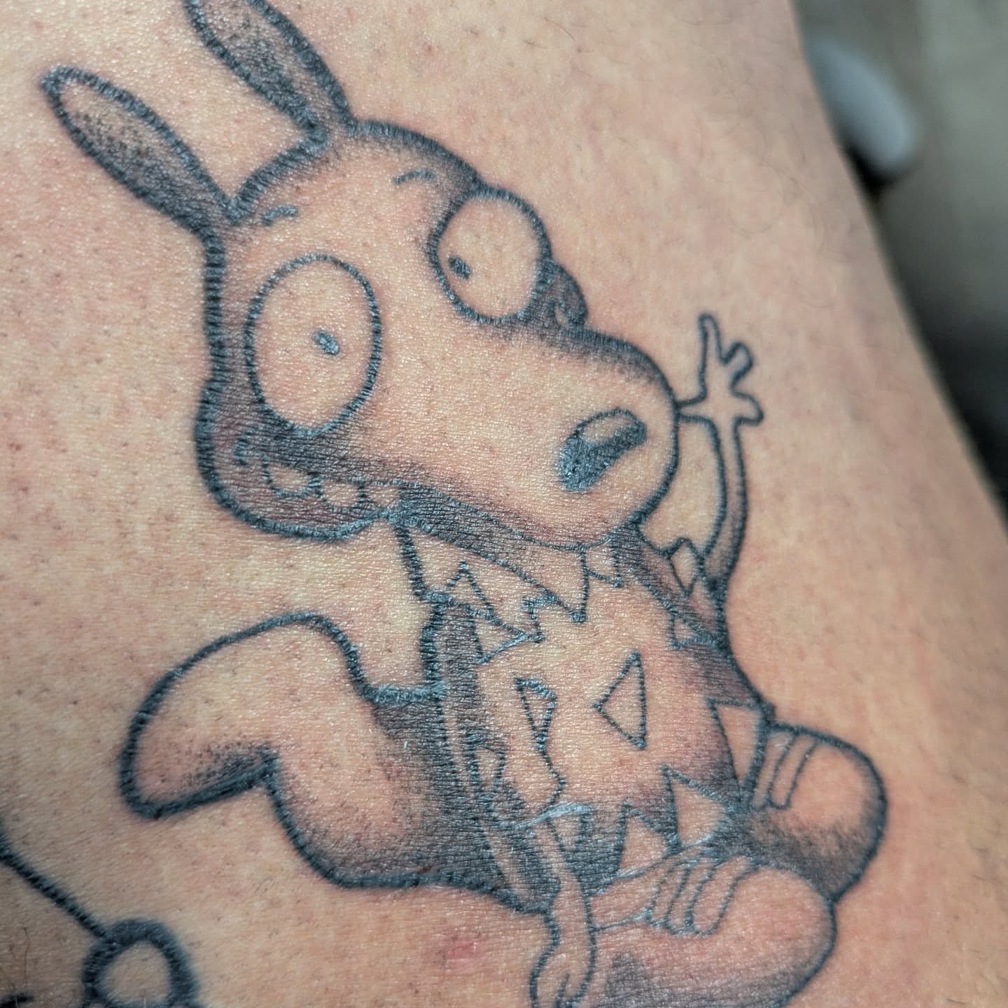 Dog black and grey tattoo on the forearm by Matt Mahl