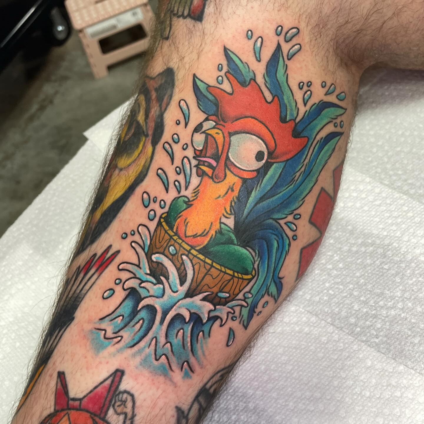 Rooster in basket American traditional tattoo on the forearm by Eric (EK) Kuldell