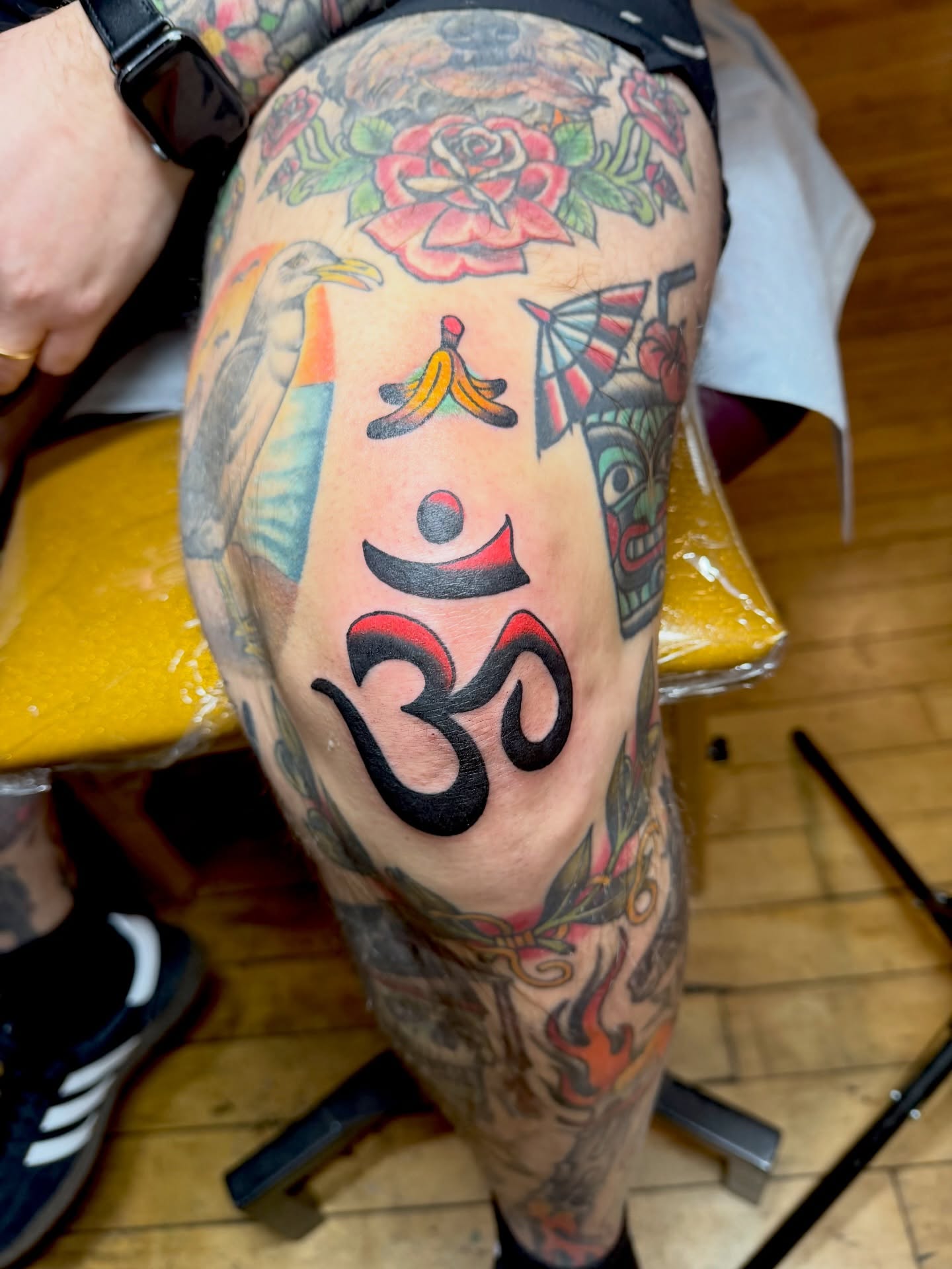 Om symbol American traditional tattoo on the thigh by Steven
