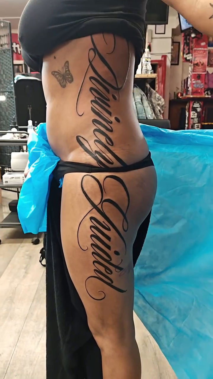 Divinely Guided script tattoo lettering tattoo on the leg by @cvpital